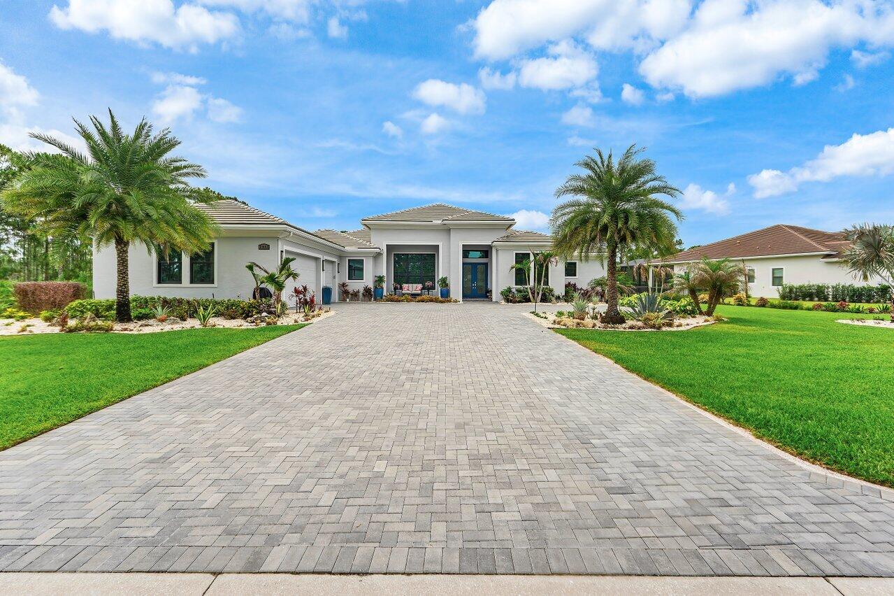 **Exquisite 4BR/4.5BA Estate in Prestigious Gated Community**  Welcome to this exceptional luxury residence, perfectly situated on a secluded premium ¾-acre lot with breathtaking preserve views on three sides, offering unparalleled privacy and tranquility. This meticulously upgraded 4-bedroom, 4.5-bath home combines elegant design, superior craftsmanship, and resort-style living. Step outside to your private backyard oasis featuring a stunning salt water pool with a built-in infinity-edge spa, designer landscaping, fenced yard, and an outdoor mosquito misting system with automatic controls. The expansive outdoor living area includes an extended patio, pergola with automatic retractable roof, electric screen-enclosed lanai, and a custom summer kitchen—perfect for entertaining year-round.   Inside, you'll find sophisticated finishes throughout, including crown molding, designer lighting, solid-core interior doors, custom closets, whole house water softener and purifier. All electric window shades with impact-resistant windows and doors are enhanced with ceramic film for increased energy efficiency and comfort. The A/C system upgraded to ultra efficient Rheem Prestige variable speed unit. The spacious laundry room offers extended cabinetry and abundant storage.  Additional premium features include an air-conditioned garage with insulated doors and epoxy floors, extended driveway, tankless water heater, 26kW whole-house generator, A $20,000 Audio-Video system with speakers, cameras and surround sound, both inside and outside the house. TAEXX built-in pest control system within exterior walls, and premium Icynene spray polyurethane foam insulation in the attic for exceptional energy efficiency.  Located in one of the area's most sought-after gated communities, this extraordinary home offers the perfect blend of luxury, privacy, and modern convenience. Every detail has been thoughtfully designed and upgraded, creating a truly move-in-ready dream home that must be seen to be appreciated.   A rare opportunity to own a truly exceptional home in an exclusive gated community. Schedule your private showing today.