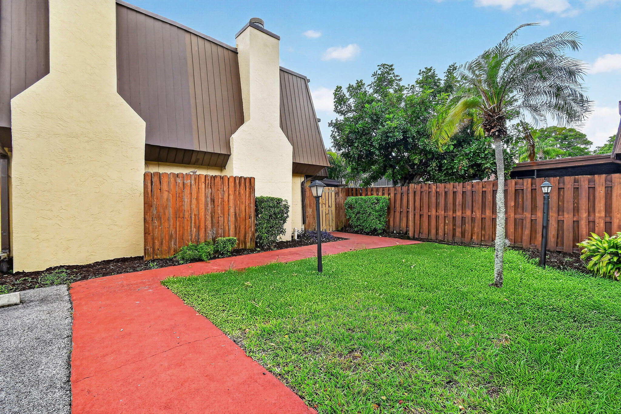 Discover the hidden charm of Cedar Gardens — a quaint townhome community perfectly positioned in the heart of Palm Beach Gardens. Offering spacious floorplans, private outdoor spaces, and a peaceful neighborhood feel, Cedar Gardens combines comfort, convenience, and affordability in one of Palm Beach County's most sought-after locations.  Residents enjoy easy access to upscale shopping, fine dining, beautiful beaches, championship golf, and top-rated schools, all just minutes away. With its central location near PGA Boulevard, I-95, and the Turnpike, Cedar Gardens provides the perfect balance of quiet residential living and everyday convenience.  Whether you're searching for a primary residence, seasonal getaway, or investment opportunity, Cedar Gardens offers exceptional value & location. Roof 2026  A/C 2021