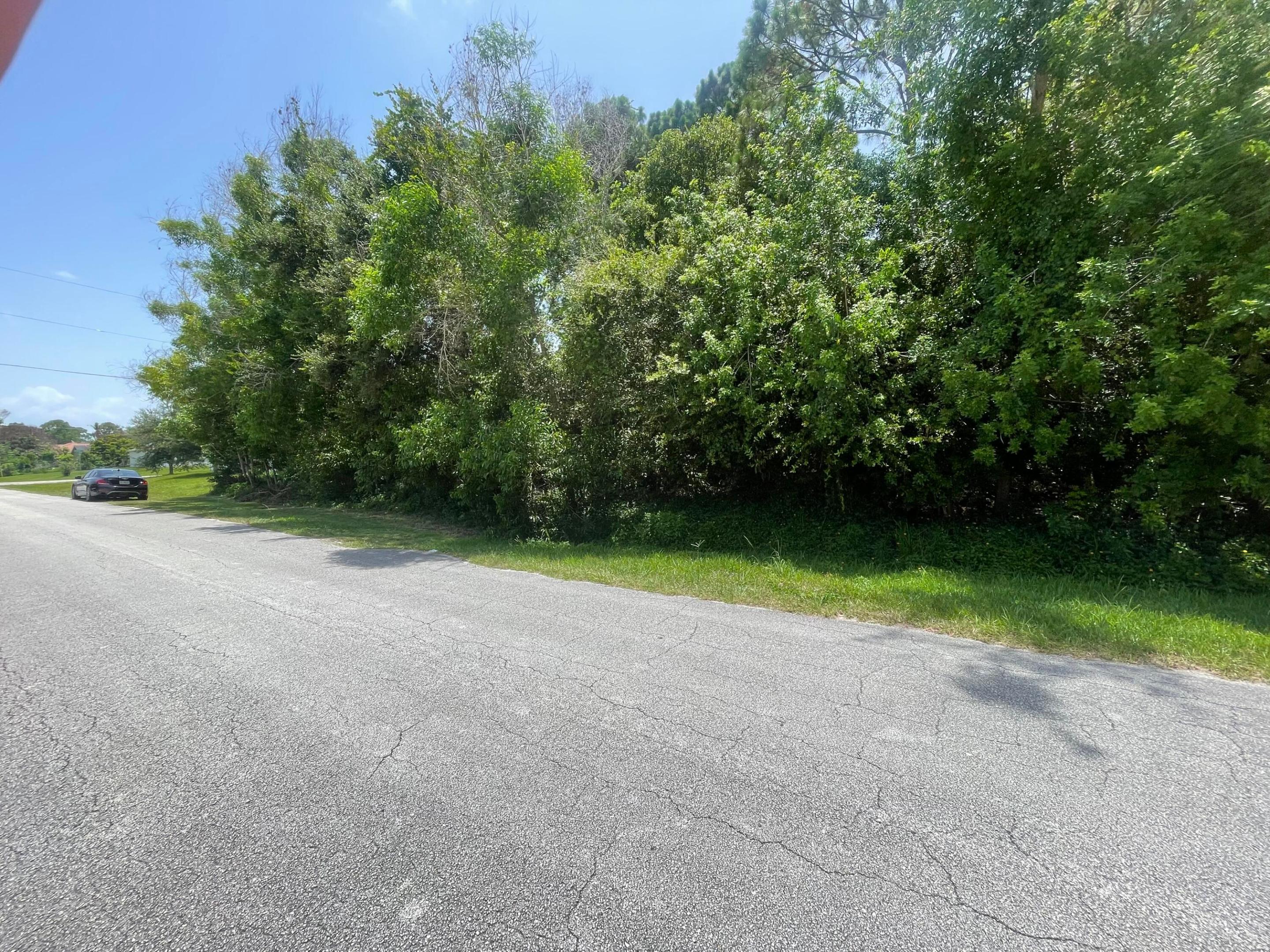 Build your Florida dream home on this oversized 0.33-acre residential homesite located in a growing neighborhood of Port St. Lucie. This oversized corner lot provides ample space for a custom home, pool, and outdoor living area with no HOA restrictions.  Conveniently located near shopping, restaurants, schools, parks, golf courses, medical facilities, I-95 and Florida's Turnpike, offering easy access for commuters while maintaining a peaceful residential setting. Just a short drive to beautiful beaches, boating, fishing, and all that Port St. Lucie has to offer. Whether you're ready to build now or looking for a long-term investment, this oversized parcel presents an outstanding opportunity in one of Florida's fastest-growing areas. Don't miss your chance to own a piece of paradise