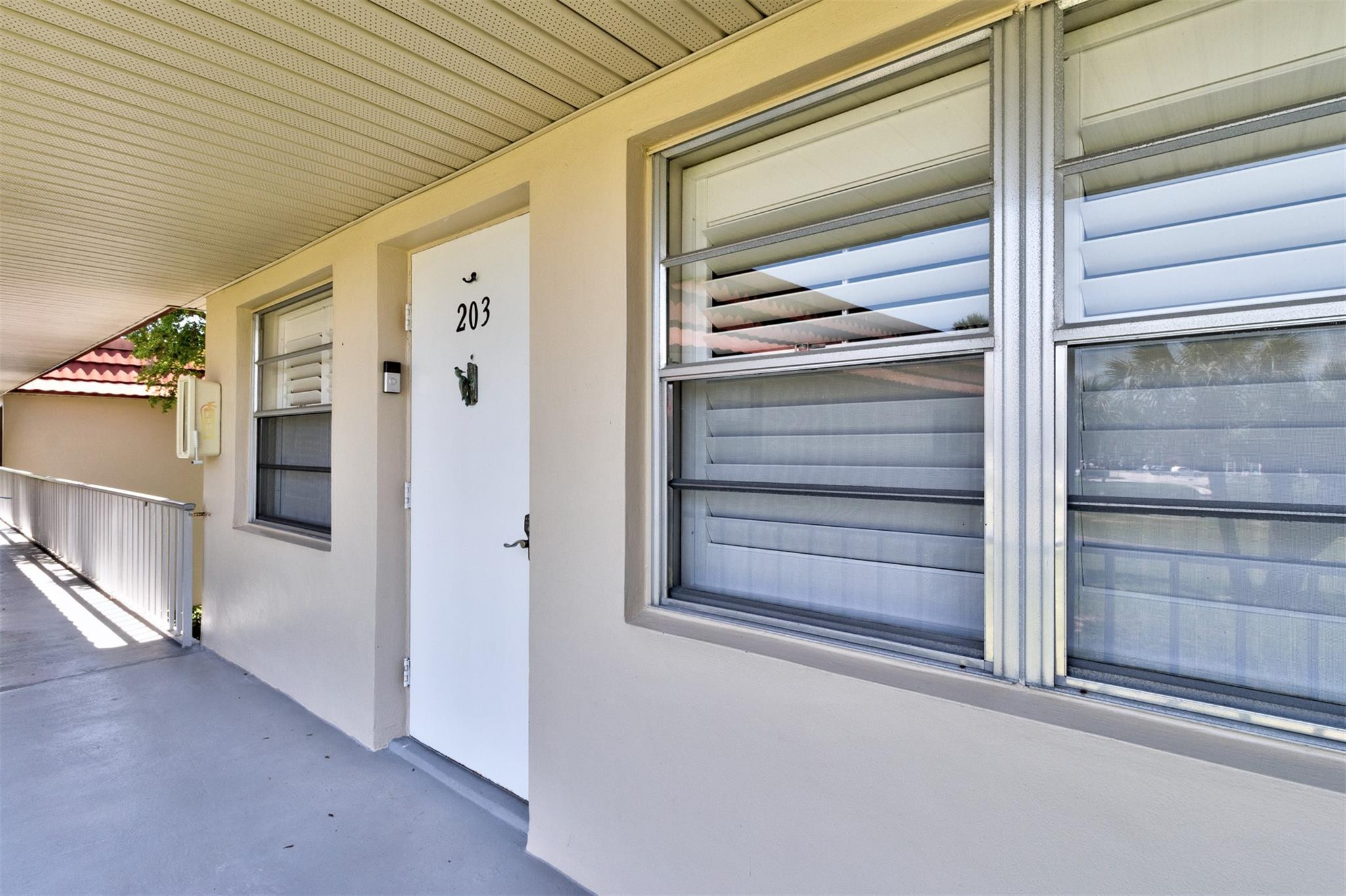 55+ Two Bedroom, Two Bath with 3rd bedroom or Den/flex Two condos gorgeously remodeled into one beautiful home. 1394 sq ft. (includes the 2 porches) Spanish tile floors, 2 new AC's and hot water heaters, 2 porches, all new double sink master bath. Golf, Tennis, Pickleball, 4 pools and clubhouses, workout room, Restaurant and very active community. Furniture is negotiable. Laundry in the unit. Internet and cable comes with the HOA