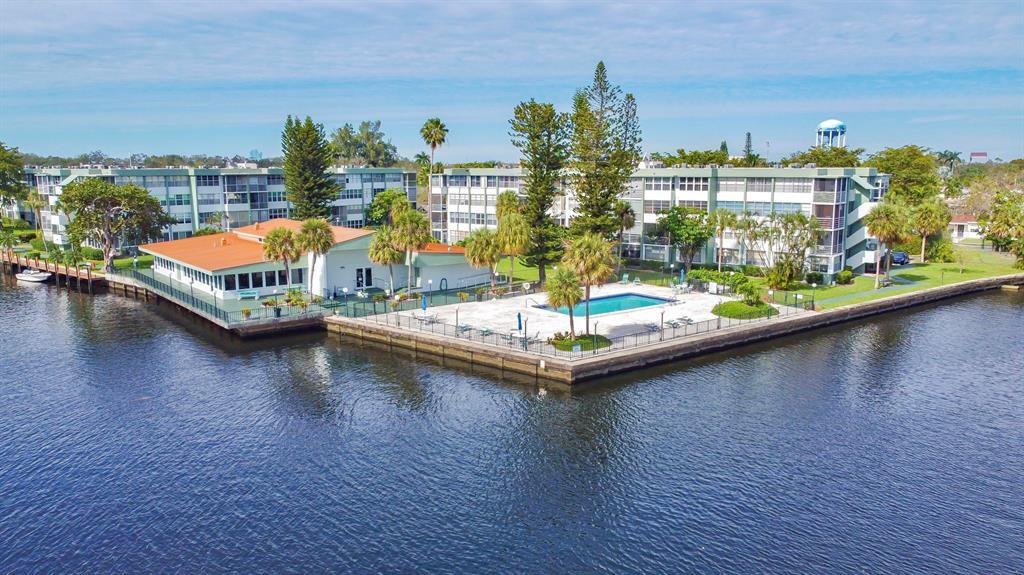 AMAZING VIEW OF THE WATER AND POOL! WATERFRONT COMPLEX 1 BEDROOM 1.5 BATHS, A.C HAS BEEN REPLACED IN JULY 2023 ! KITCHEN HAS GRANITE COUNTERTOPS, RECESSED LIGHTING AND STAINLESS STEEL APPLIANCES, TILE THROUGHOUT, COMMUNITY FEATURES 2 POOLS (ONE HEATED), GYM,  SAUNA, TENNIS,  CLUBHOUSE, BBQ GRILLS, AND BOAT DOCKS UPON AVAILABILITY. MAINTENANCE INCLUDES BASIC CABLE, WATER, GARBAGE, AND PEST CONTROL. **** IT CAN BE RENTED RIGHT AWAY **** BUILDING HAS RESERVES !