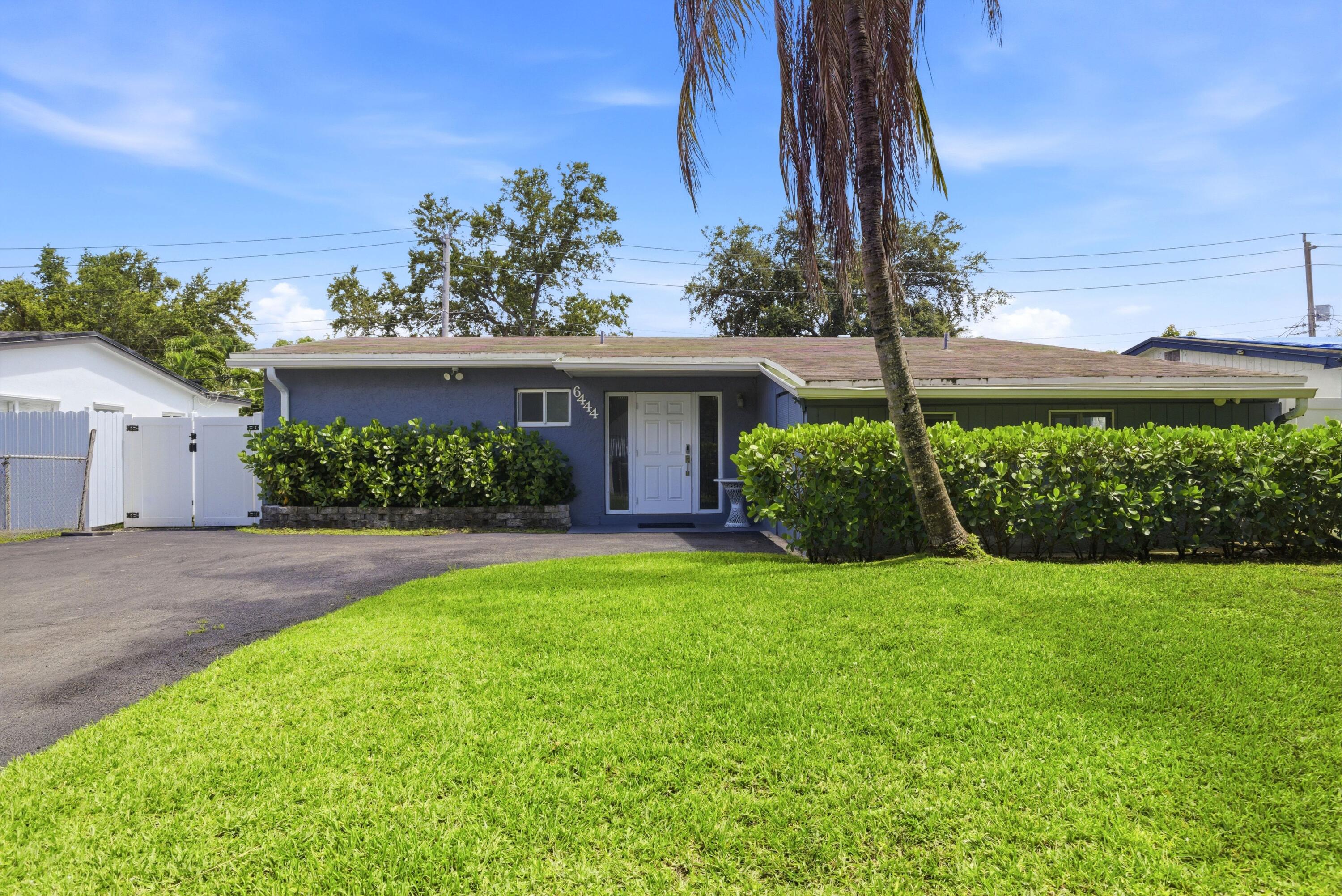 Completely remodeled from top to bottom, inside & out, this exceptional 3-bd, 2-bth home offers the rare combination of modern upgrades, peace of mind & true move-in-ready convenience. Major improvements include impact windows, newer A/C & extensive renovations throughout, allowing the next owner to simply move in & enjoy. Inside, you'll find a bright, inviting floor plan filled with natural light, updated finishes & comfortable living spaces designed for everyday living & entertaining. The backyard is where this home truly stands apart. Recently transformed into a private retreat, it features a massive new heated pool, expansive pool deck, fresh landscaping & plenty of yard space to relax, entertain & enjoy the South Florida lifestyle year-round. A rare turnkey opportunity where the Full home remodeled since purchased in 2023, new pool, bathrooms and kitchen remodeled. Landscaping and patio improved as well.