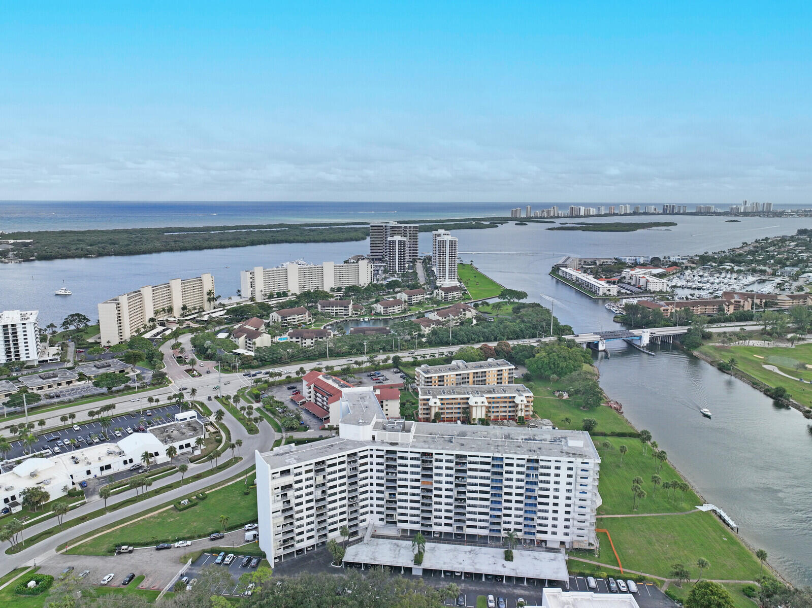 Available July 1st, 2026! This stunning 11th-floor annual rental at the Gemini Condominium offers breathtaking southern views of the ocean, intracoastal, and golf course. With 2 spacious bedrooms and 2 bathrooms, the condo features tile floors throughout, creating a clean and modern aesthetic. A common laundry area is conveniently located just steps away from the unit. Enjoy access to a range of community amenities including a refreshing pool, fully-equipped gym, Tiki hut for entertaining, and a social room perfect for gatherings. This prime location is just minutes from the North Palm Beach Country Club, beautiful beaches, top-rated restaurants, and shopping destinations. Don't miss the chance to live in this vibrant, coastal community!