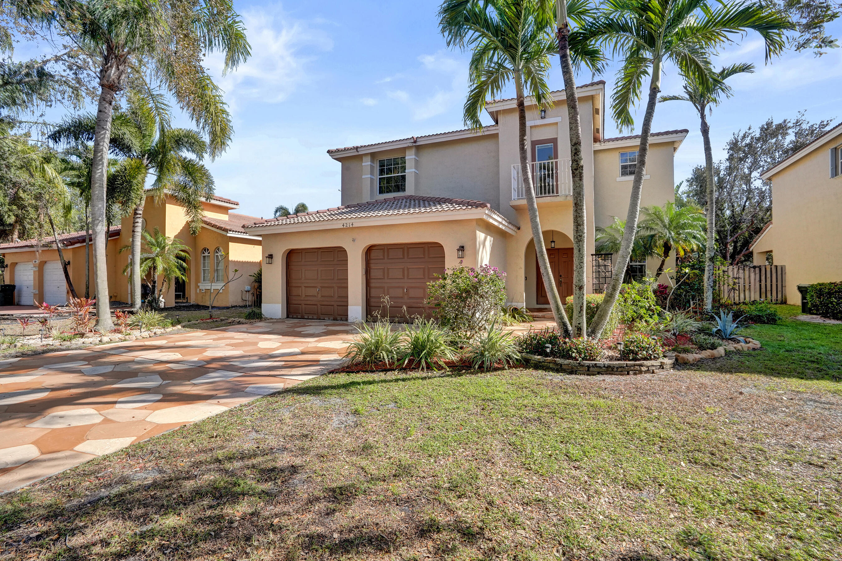 4BR/3BA pool home with screened lanai in the gated Coquina community of Coconut Creek. Spacious floor plan featuring fresh interior paint, front-load washer/dryer, Juliet balcony, bonus room with built-in media center, and walk-in closet. Enjoy a private backyard with pool and screened patio, ideal for year-round outdoor living. Pool maintenance and landscaping are included and paid by the owner. Home security system included. Residents have access to the community pool. Conveniently located near shopping, dining, parks, and major roadways. Pets allowed with no pet deposit required. Available for a 12-month lease. HOA approval required; HOA requires a $1,050 deposit. 700 credit score required for all adults.