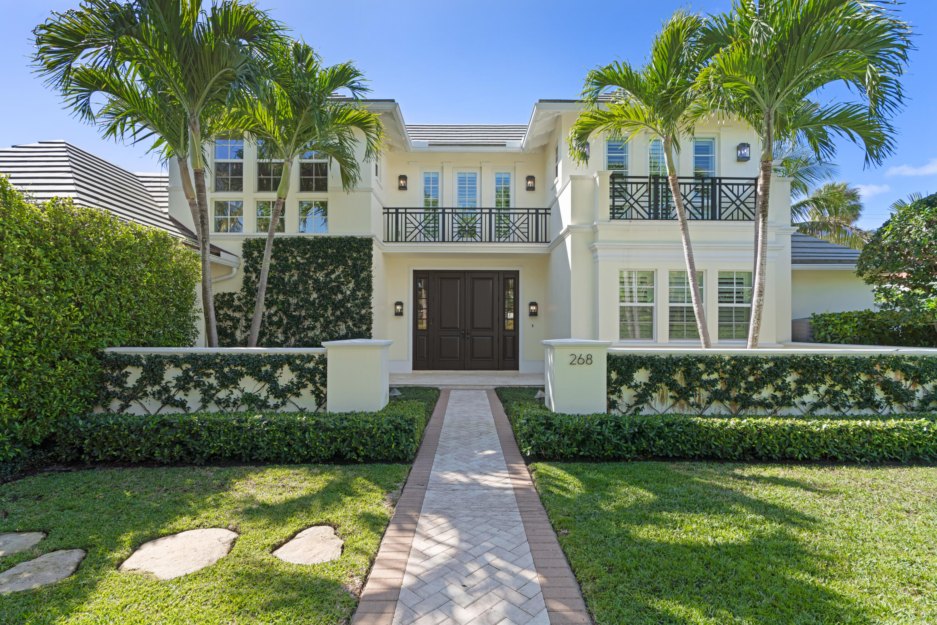 Welcome to 268 Jamaica Lane, a completely turn-key residence offered designer-furnished on the highly desirable North End of Palm Beach. Featuring full interior design by Restoration Hardware and Hive, this exquisite residence boasts 4 beds, an office, an upstairs bonus room, and 5.5 baths spread out over 5,358 total square feet of living space.  The home has a gorgeous covered outdoor loggia by the pool that is perfect for entertaining and al fresco dining. Inside the home, you'll find a beautiful downstairs master suite with his and her closets and baths which opens graciously to the heated pool and also connects to a full home office.  The downstairs boasts a formal living room, dining room, chef's kitchen, and inviting family room off the kitchen. All of the key living spaces, including the formal living room in the center of the home, universally open towards the well-landscaped pool area and spa, which provides quintessential island living for the home's resident's. Upstairs, there are three generously sized bedrooms, including one "VIP" suite with a large terrace overlooking the pool. The two additional bedrooms all include en suite baths, with one currently being set up like a "bunk room".  There is also an additional "bonus room" which makes for a great kid's playroom or media center.  Well located in the heart of the North End, 268 Jamaica Lane enjoys convenient access to the Lake Trail directly on Jamaica Lane.  The home was newly built in 2014 by Malasky Builders, and can also be sold with all the furnishings for $14,500,000. Just bring your toothbrush!