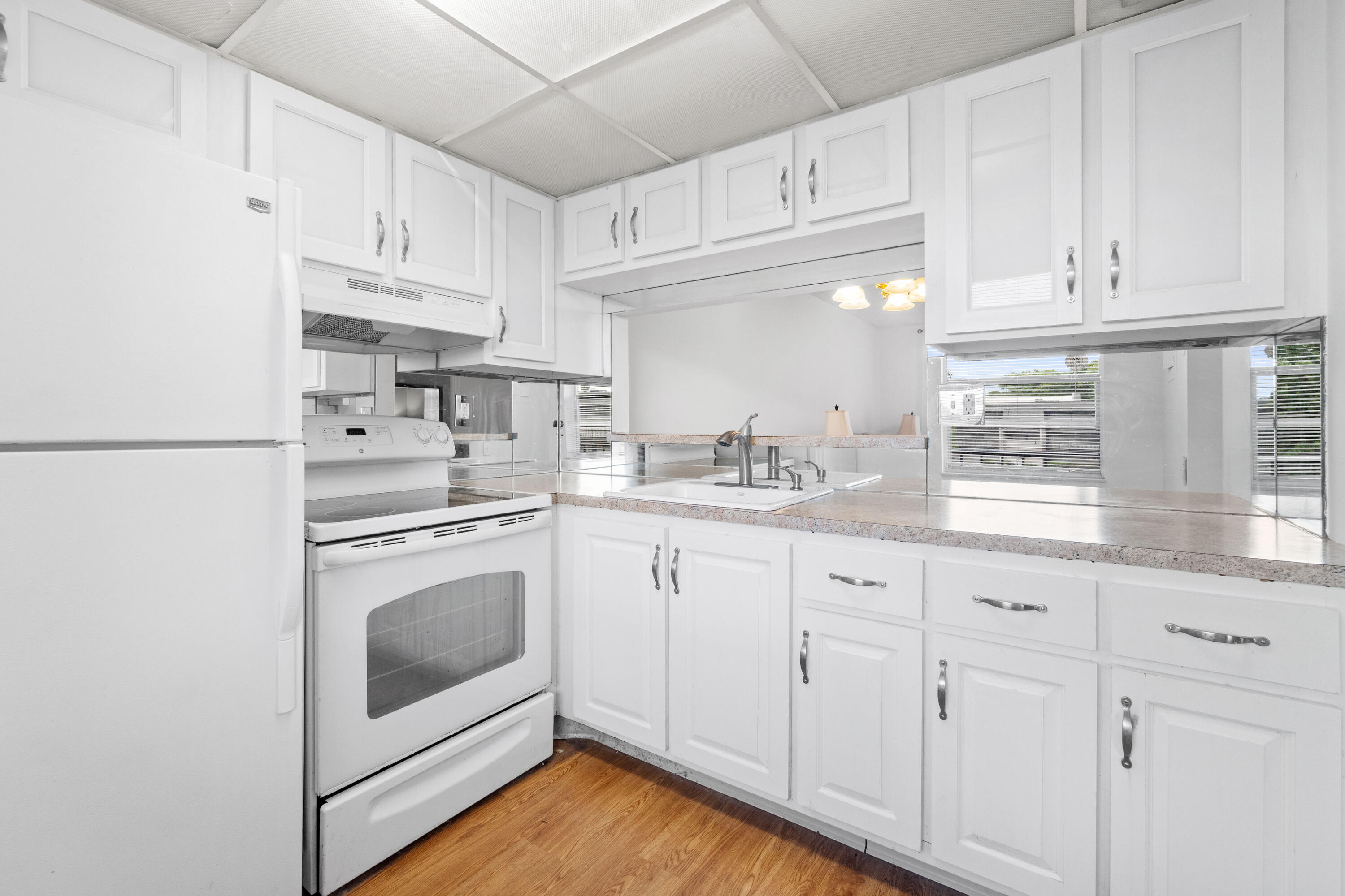 Welcome to this beautifully maintained 1 bed, 1.5 bath residence in the desirable 55+ community of Lime Bay in Tamarac. This bright and inviting unit features a stunning water view from the large balcony, durable vinyl flooring, an updated kitchen, and a functional layout designed for comfortable South Florida living. Enjoy peace of mind with key major improvements including a 2025 A/C system and a roof approximately 5 years old, along with updated flooring completed within the last 5 years. A well-kept home offering excellent value in a sought-after active adult community. Enjoy all of the amenities the community has to offer including shuttle bus, clubhouse, multiple pools, hot tub, and more! Low monthly HOA includes water, trash, pest control, and building insurance.