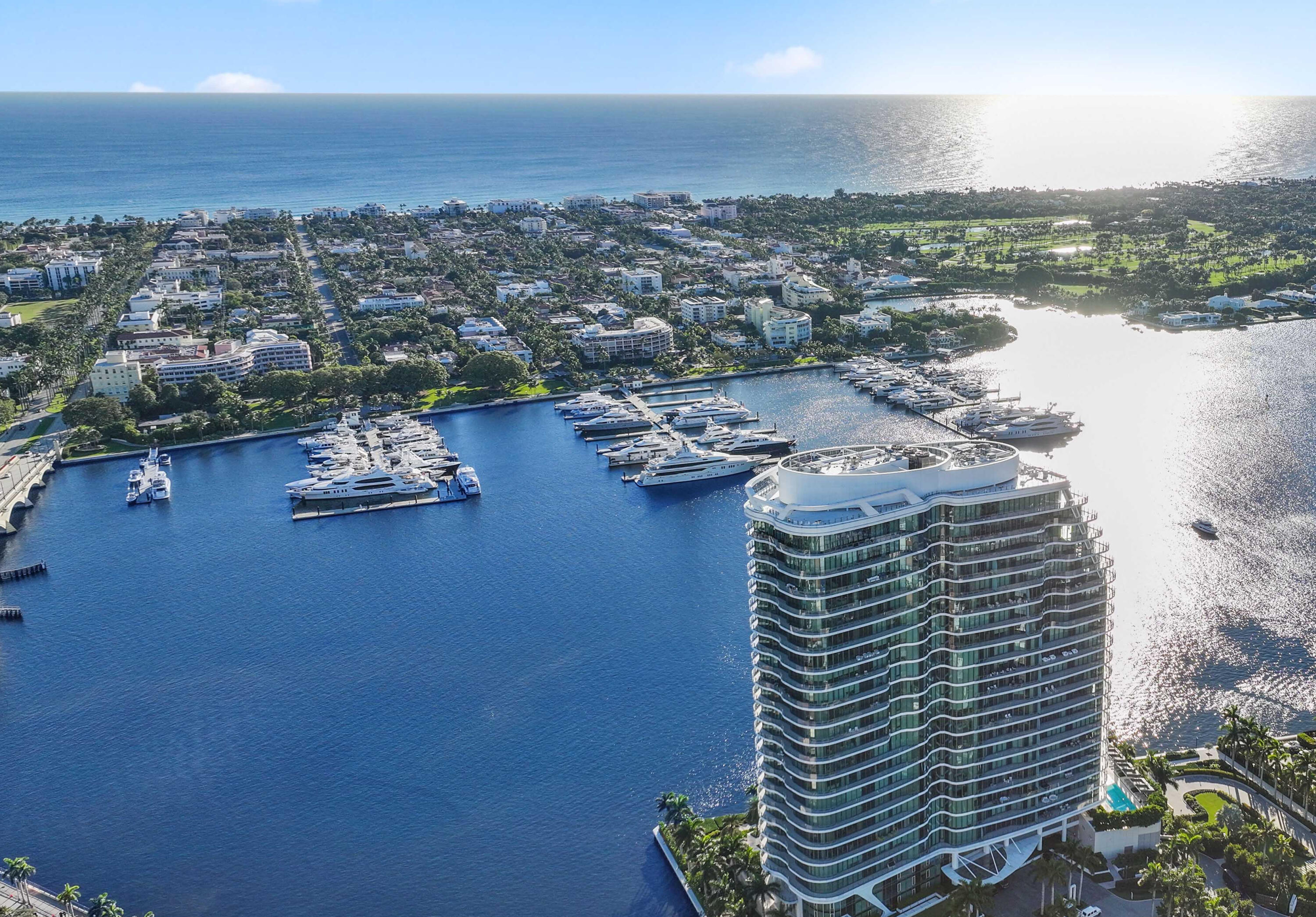 THE ONE YOU'VE BEEN WAITING FOR!! An extraordinary completely custom one-of-kind residence including a rare private garage designed for 3 vehicles. An elevated architectural masterpiece designed for those who demand the finest. This contemporary 4-bedroom,  custom built by Shapiro Pertnoy, includes a substantial waterfront office and an abundance of light-filled entertaining areas that span an impressive 5,544 interior sq ft. Experience the grandeur and comfort of your own private estate within the most exclusive ultra-luxury building in Palm Beach County. An exquisite primary suite features unrivaled ocean & Intracoastal views which can also be admired from each of the two bathrooms surrounded by marble ceilings, walls, & floors. The dual oversized & elegantly appointed dressing room definitely do not disappoint. The gracious and thoughtfully designed kitchen consists of Miele and Wolf appliances, gas and induction cooktop, dual ovens, steam oven, dishwasher, refrigerator drawers and 2 spacious pantries.  Conveniently located between the kitchen and formal dining area, you will discover a beautiful meticulously curated bar and a hidden wine fridge. Expansive 11-ft floor-to-ceiling glass surrounds the entire residence, seamlessly blending indoor and outdoor living while taking in breathtaking panoramic views and the yachts at the Palm Beach Marina. A sprawling 1,500-sq ft wraparound terrace provides the ultimate retreat for entertaining or relaxation. A state-of-the-art air and water filtration system with UV purification ensures a healthy living environment, while a thoughtfully customized private storage closet near the service entrance enhances convenience and organization. The Bristol offers a truly exceptional lifestyle, including the most impressive 5-star amenities and special attention to detail including on-site professional concierge, two spas, a cold plunge, beauty salon, waterfront fitness center, 75-ft swimming pool, club lounge, and indoor/outdoor dog park (pet friendly). Three house vehicles equipped with a driver, gated entrance, valet and front desk both available 24-hours. Just moments from Palm Beach Island, the world-renowned Worth Avenue, premier private aviation, Palm Beach International Airport, and the exclusive Palm Beach Marina. This is not just a home, it is a lifestyle and a statement of sophistication and prestige.