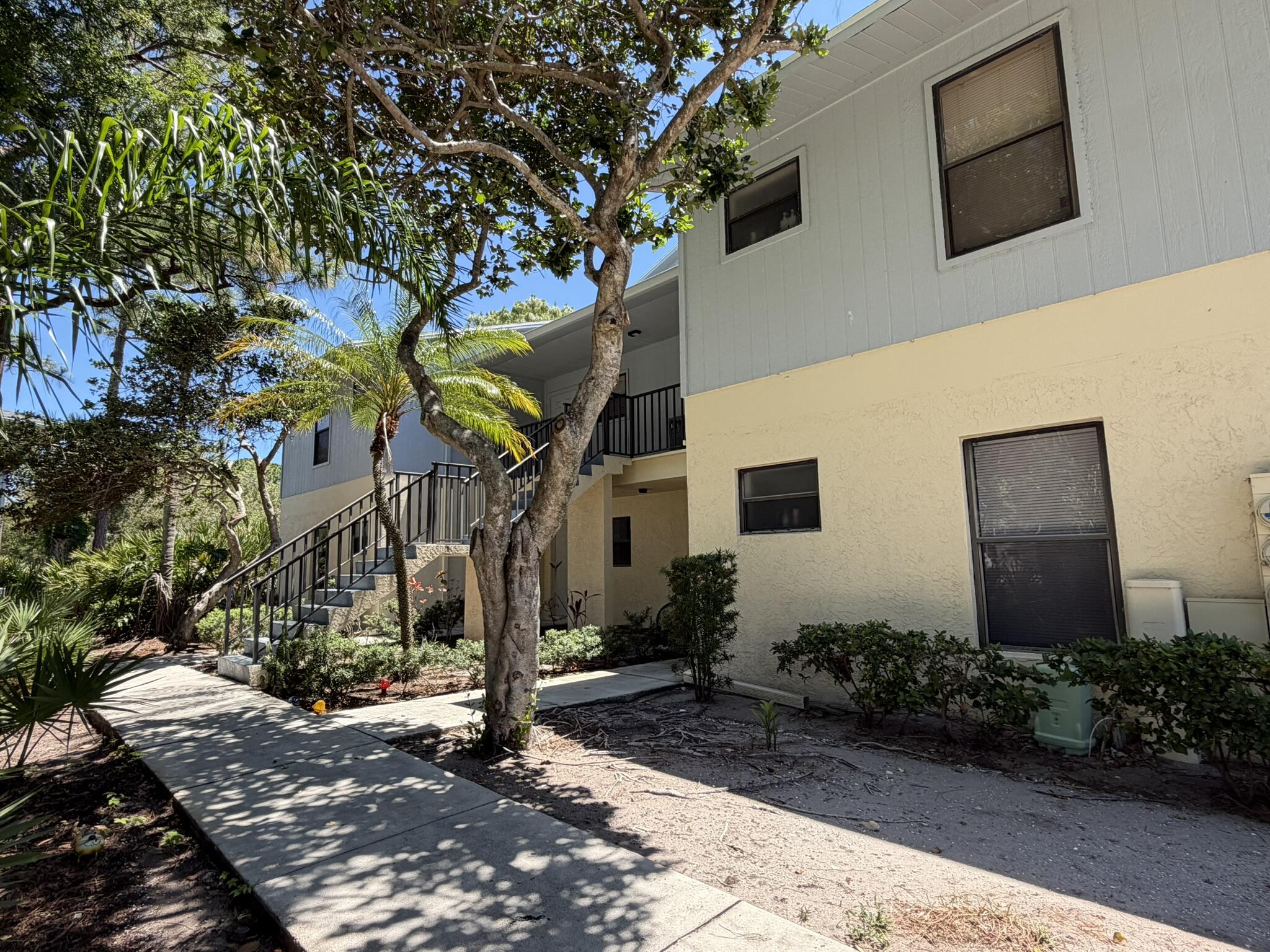 Welcome to Fairway Palms in beautiful Stuart, Florida! This charming second-floor condo offers 2 bedrooms and 2 bathrooms with a bright, spacious layout that feels warm and inviting from the moment you walk in. Move-in ready and well maintained, this quaint unit features comfortable living spaces, assigned parking, and access to a community pool perfect for relaxing and enjoying the Florida lifestyle.  Conveniently located close to beaches, restaurants, shopping, and entertainment, this condo offers the ideal combination of comfort and location. Enjoy easy Florida living in the desirable Fairway Palms community — ready for you to call home!