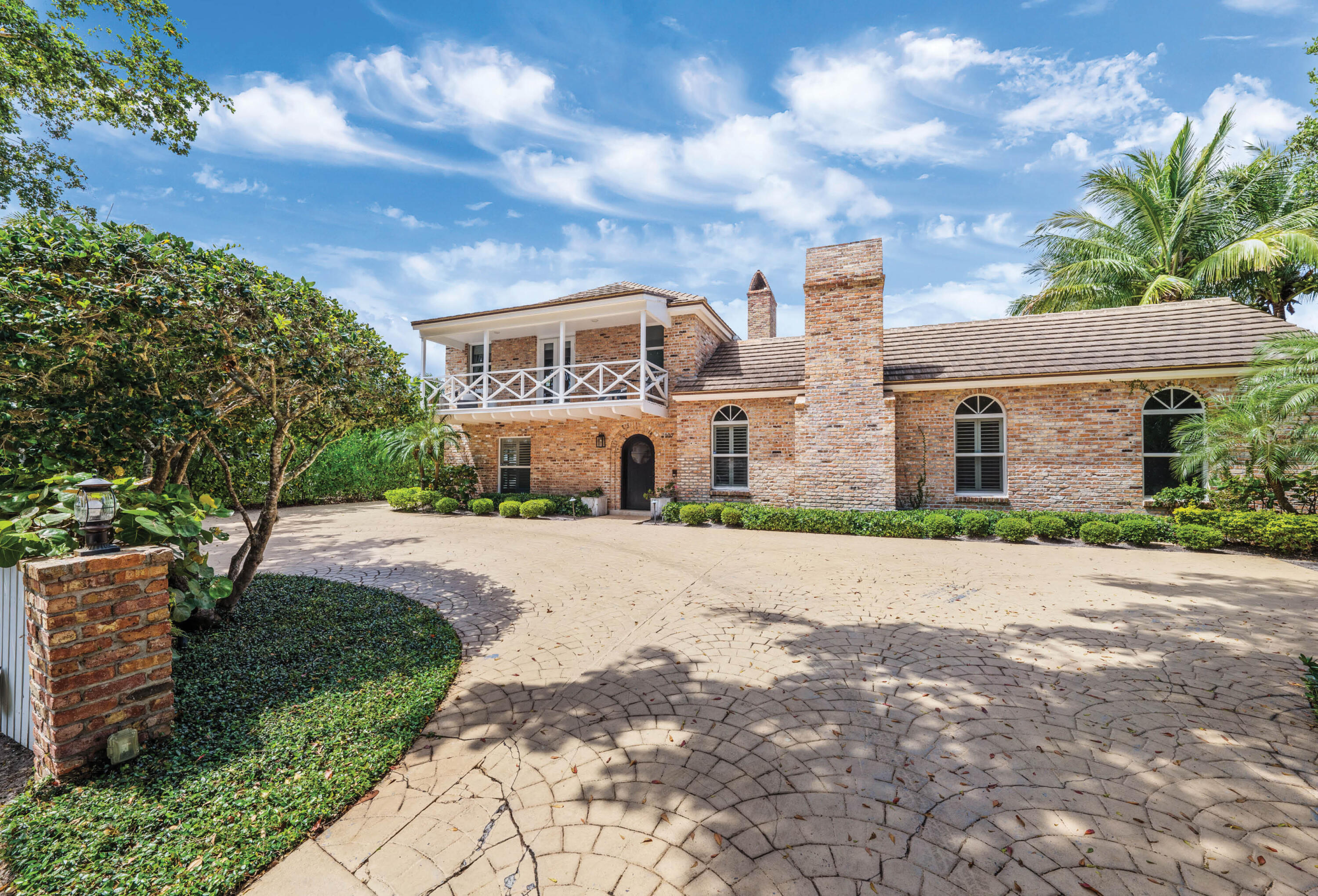 A true Caribbean island house! Located in prestigious Mariners Key and surrounded by other large waterfront homes. Character and charm abound at this stunning 5 bedroom + den, 4.5 bath waterfront home. These aren't just any water views, these are unobstructed wide channel views. This is navigable waterfront at its very best! 151' of frontage with easy water access to great restaurants and nearby inlets. Impressive front door and gracious foyer entry leaves a lasting impression. Understated, luxurious interiors are a welcoming invitation to sit down in comfort and enjoy the scenic views. Spacious kitchen with solid wood cabinetry, butcher block island and professional series appliances. Giant picture window and handmade subway tiles adorn the walls from floor to ceiling. Note: The second floor is wood frame.