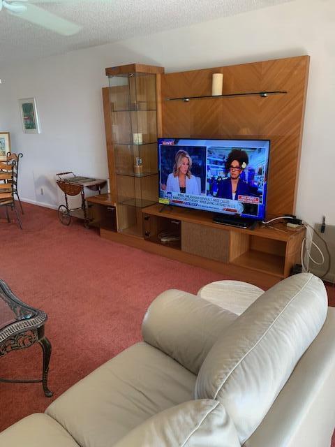 TENNIS ENTHUSIESTS! Here's a chance to own this fully furnished top floor 781 sq ft 1/1 condo. Move in ready or rent immediately. Full size W/D in the unit. A/C new 2024, Water heater new 2024, new roof 2024. Roaming security at night. Development has 22 HAR TRU tennis courts with tennis pro shop, clubhouse and Olympic size pool. Great winter retreat or INVESTORS can rent immediately.