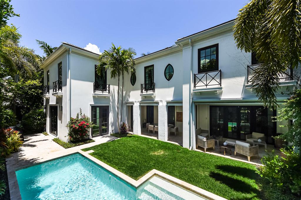 Gorgeous townhome built in 2016 with stunning details throughout. Fantastic In-Town location on the ocean block of Sunset Avenue. Highlights include elevator, private pool, grand library and 2 car garage. Beautiful entertaining spaces with large living room with fireplace, chef's kitchen overlooking family room and dining, and oversized covered loggia with outdoor fireplace. Owner's suite features dual baths and large walk-in closets. Two spacious guest suites with en-suites.
