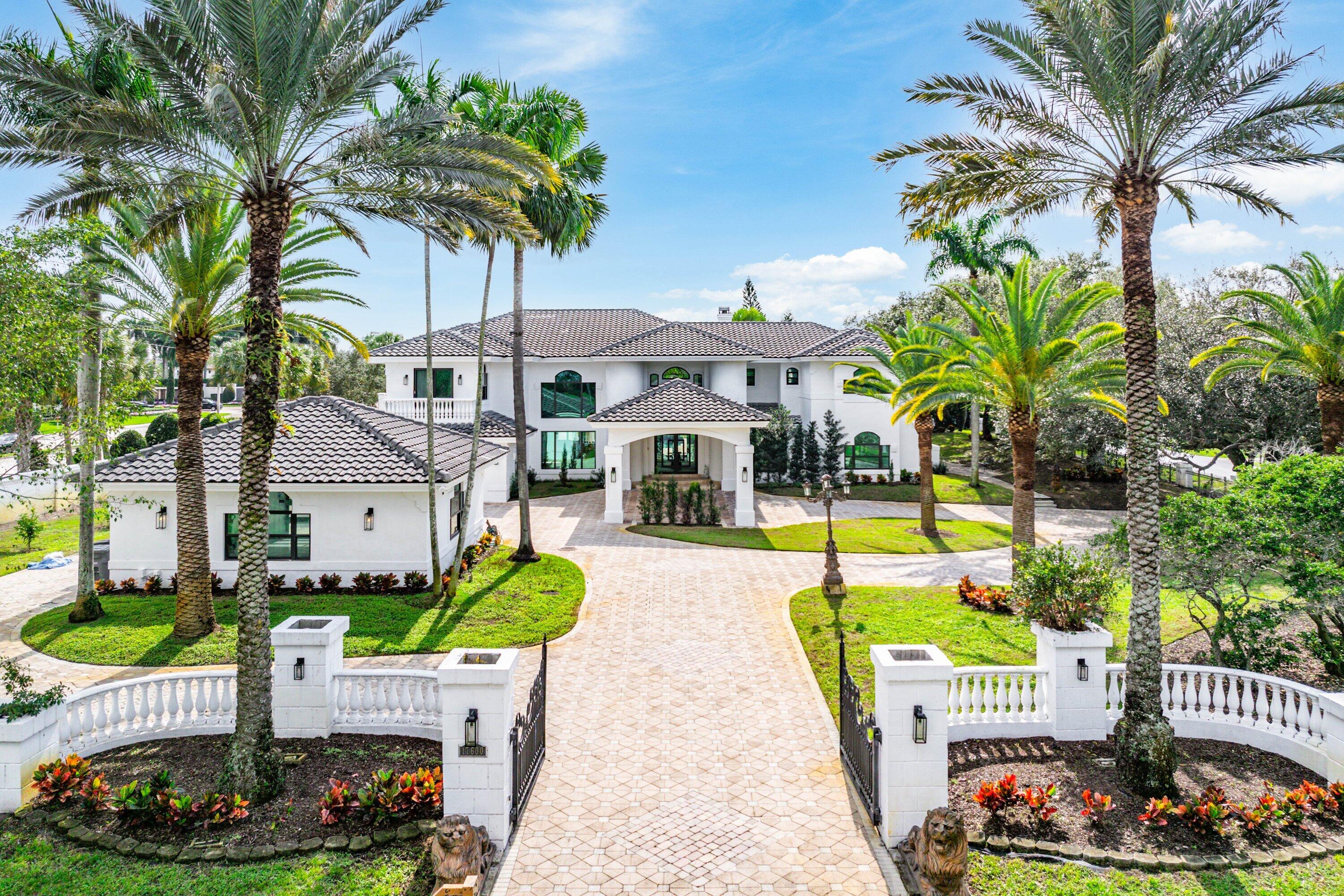 Beautifully reimagined & completely redone Interior, this 1.14-acre estate in the exclusive guard-gated community of Fieldbrook Estates blends timeless elegance with modern luxury. A grand tropical drive lined with Royal and Canary palms leads to a dramatic portico and soaring double-door entry opening to a magnificent foyer with a sweeping dual staircase. Expanded & enhanced throughout, 9BD & 8.2BA with exquisite finishes, custom ceilings, crown molding, state-of -the-art Home theatre, Gym, Sauna & a gourmet chef's kitchen with top-tier appliances. The spacious layout includes multiple living areas plus a beautifully finished 2-bedroom guest house with full kitchen, office, private driveway, & separate entrance. Minutes to A-rated schools, beaches, shopping,& fine dining, Crypto accepted Comprehensive Features & Upgrades
Major Enhancements

Dual Aquasana whole-house filtration system
All new instant/tankless hot water heaters
5/8" drywall throughout entire property
Sound-insulated and heat-insulated interior & exterior walls
R38 attic insulation (main house, guest house, detached garage)
Brand-new R8-insulated ductwork
5 new top-of-the-line Lennox Signature AC units (zoned individually)
3 mini-split AC systems (garages + side room)
Entire property extremely energy-efficient; electric bill averages only $600-$700/month
Roof 2021
Smart Home Technology
Fully integrated Savant smart home Theater system
ELEGRP smart lighting & controls
11-zone 5 AC's automation
25-camera security system with remote access
CAT8 wired internet throughout
Dual internet: Xfinity + Starlink
Luxury Interior Finishes
All new top-of-the-line designer tile
Custom epoxy flooring in garages
Custom Crystalia glass wine enclosure display area 
$50,000 high-end home theater system
Dedicated arcade/game area
Private sauna
Butler's pantry with sink
Full home gym
9 full bedrooms + movie theater + arcade + gym + sauna + office + playroom/misc. room
Windows, Doors & Exterior Enhancements
$240,000 in brand-new impact windows & doors
Newly tiled wrap-around patio (1,700 sq ft) with smart LED lighting
Mini-putt golf course & picnic area
Outdoor chess court
Resort-style gazebo
25,000 Sq ft New Zoysia grass 
130 newly planted cypress trees for privacy
Brand-new full-property sprinkler system
Outdoor shower
Three separate driveways; parking for 20+ vehicles

Guest House (1,100+ sq ft)
1 bedrooms
1 baths
Full kitchen
Living room
Office
Private driveway & entrance

Additional Notes
Crypto Currency Accepted
One of only 54 one-acre+ estates in Fieldbrook Estates
Guard-gated, ultra-private, low HOA, no membership required
Minutes from A-rated schools, beaches, airports, shopping & dining