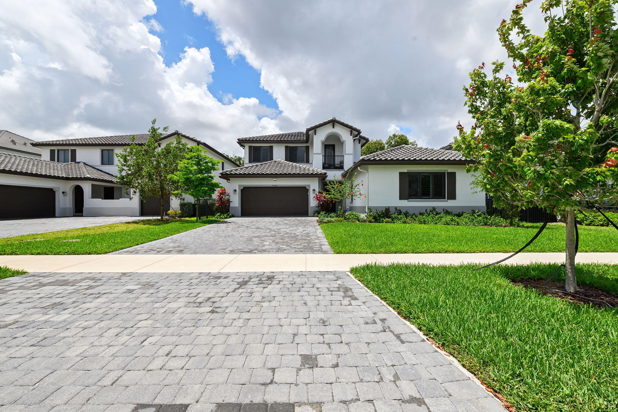WELCOME TO THE SOUGHT-AFTER GATED COMMUNITY OF KINGFISHER RESERVE IN COOPER CITY. BUILT IN 2023, THIS EXCEPTIONAL NEW-CONSTRUCTION RESIDENCE PERFECTLY BLENDS LUXURY WITH EVERYDAY COMFORT. THE PROPERTY WELCOMES YOU WITH A PRISTINE PAVED DRIVEWAY AND A STRIKING MODERN-MEDITERRANEAN ELEVATION, STEPPING INSIDE TO A SOPHISTICATED FOYER WITH CLEAN ARCHITECTURAL LINES, SOARING CEILINGS, AND LARGE-FORMAT PORCELAIN TILE FLOORING.  SPANNING 6 BEDROOMS AND 5.5 BATHROOMS, THE HOME OFFERS AN INCREDIBLY VERSATILE LAYOUT, HIGHLIGHTED BY A PRIVATE DOWNSTAIRS CASITA SERVING AS THE MULTI-FUNCTIONAL 6TH BEDROOM—IDEAL FOR GUESTS, AN IN-LAW SUITE, OR A PRIVATE HOME OFFICE.  THE HEART OF THE RESIDENCE IS A VAST, LIGHT-FILLED OPEN-CONCEPT FAMILY ROOM THAT FLOWS EFFORTLESSLY INTO AN ULTRA-MODERN GOURMET KITCHEN. THE CHEF-INSPIRED SPACE IS APPOINTED WITH FLOOR-TO-CEILING SLEEK WHITE CABINETRY, A MASSIVE CENTER ISLAND, AND HIGH-END INTEGRATED APPLIANCES. AN ELEGANT FORMAL DINING ROOM ADDS EXTRA SOPHISTICATION, BEAUTIFULLY ACCENTED BY CUSTOM PLANTATION SHUTTERS AND A MODERN CHANDELIER.  EXPERIENCE THE ULTIMATE FLORIDA LIFESTYLE WITH SEAMLESS INDOOR-OUTDOOR INTEGRATION.  A PREMIER LOCATION CLOSE TO COOPER CITY'S A-RATED SCHOOLS, THIS NEARLY NEW MASTERPIECE IS AN ABSOLUTE MUST-SEE.