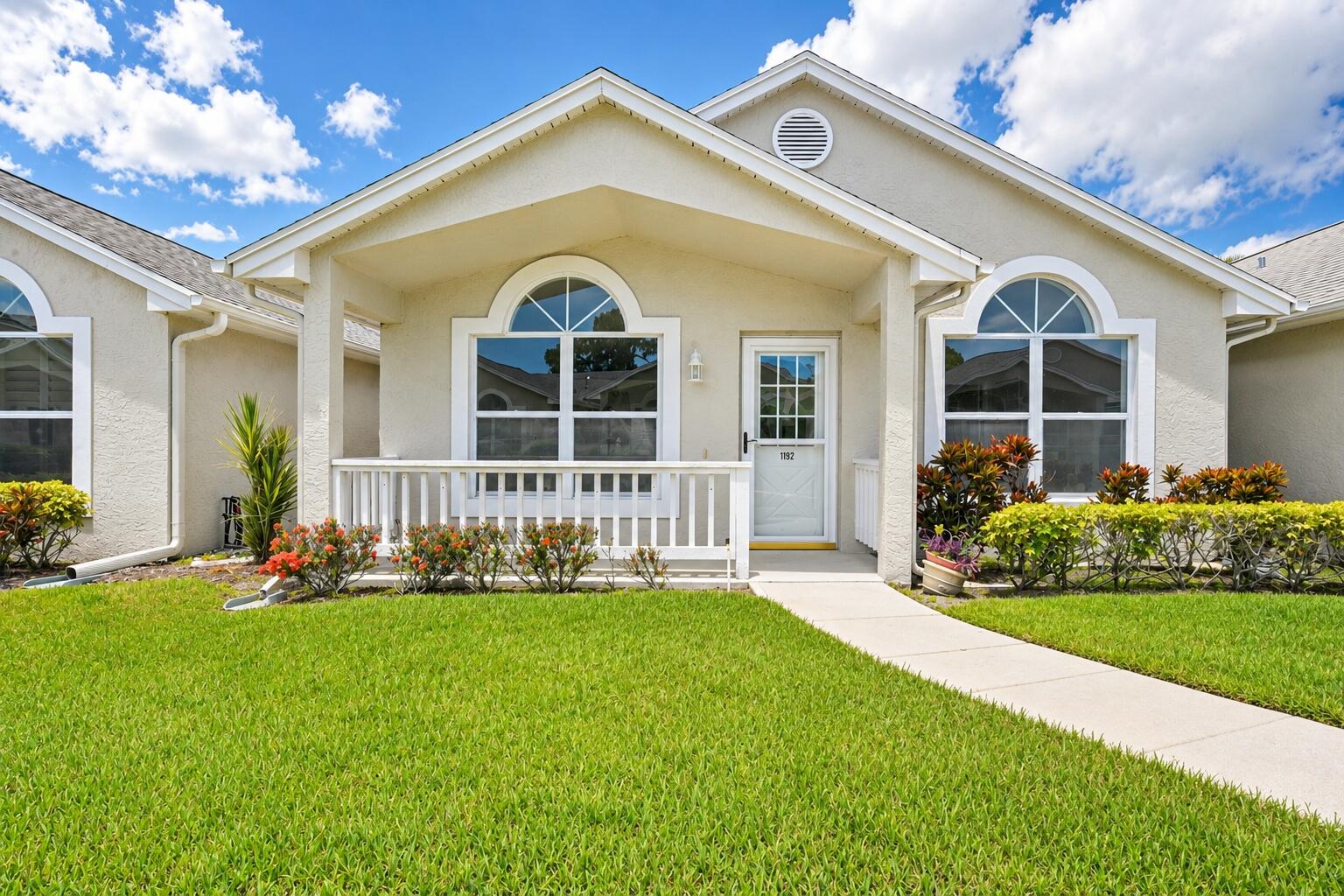 Welcome home to this super cute 2-bedroom, 2-bath townhome nestled in the highly desirable King's Isle community in the heart of St. Lucie West. Freshly painted and featuring brand-new laminate flooring throughout, this move-in ready home offers a bright, inviting layout that's perfect for year-round living or a seasonal retreat. Enjoy a low-maintenance lifestyle in this well-established community with outstanding amenities, including a clubhouse, resort-style pool, fitness center, tennis, social activities, and beautifully maintained grounds. Conveniently located just minutes from shopping, dining, medical facilities, and major highways, you'll love everything St. Lucie West has to offer. Don't miss this opportunity to own an updated home in one of the area's most sought-after community.