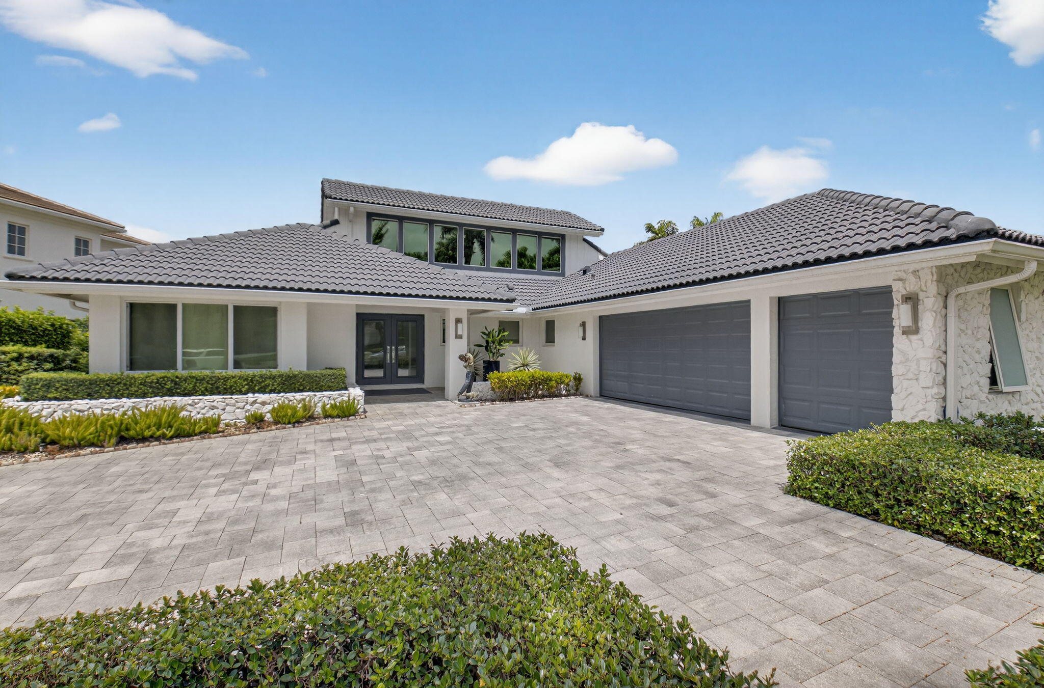 Renovated one-story home with 3 bedrooms + office on an OVERSIZED LOT in St. Andrews Country Club! The home is open, light and bright, and features all hurricane impact windows and doors, a full-house generator, retractable screens, and more. Outside is a built-in BBQ, spacious lawn area, and sprawling golf course views.