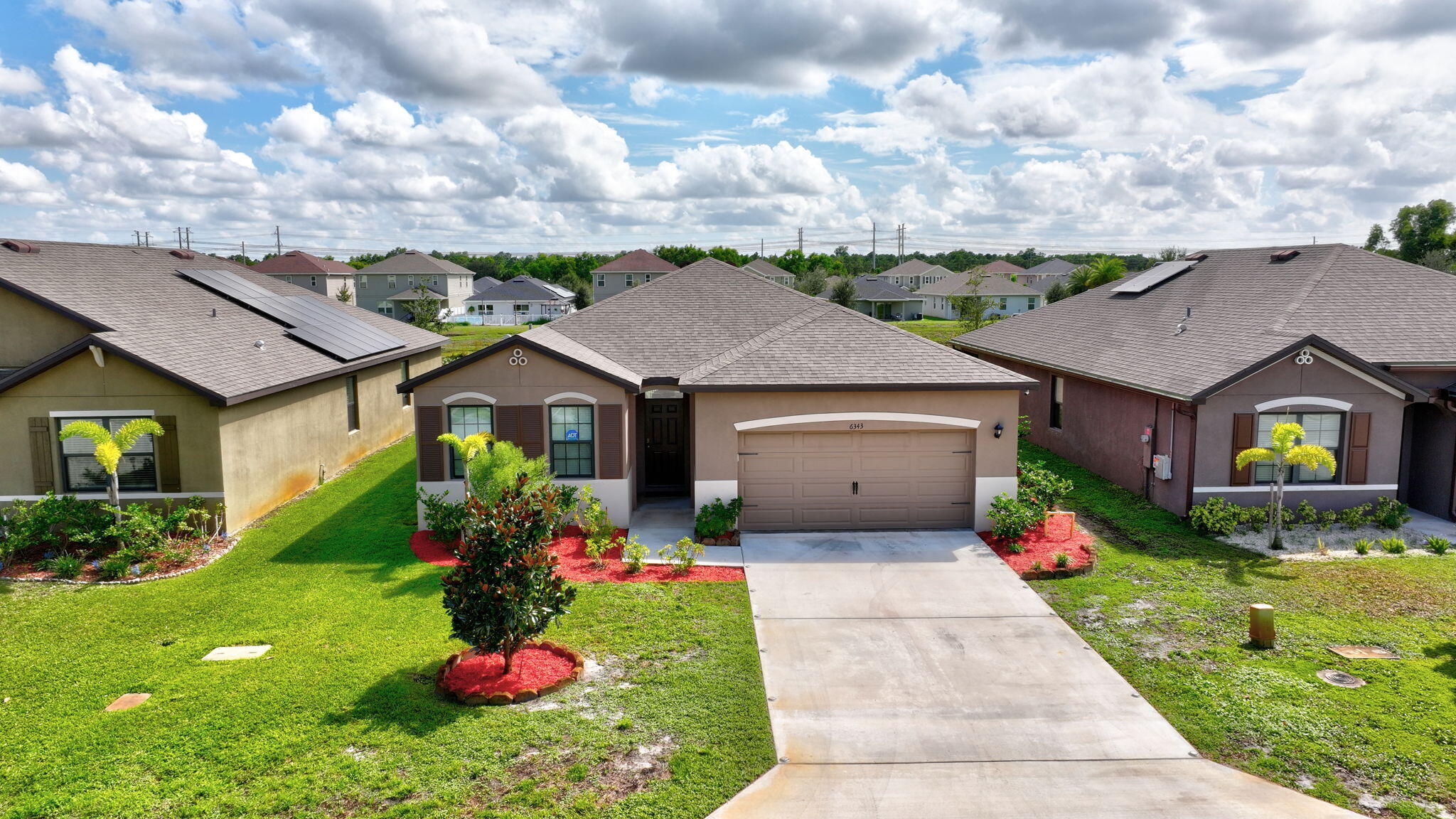 DON'T MISS THIS INCREDIBLE OPPORTUNITY TO OWN THIS BEAUTIFUL 4/2/2 WITH OVER 2000 SQ FT OF LIVING AREA . ST ANDREWS IS A VERY DESIRABLE GATED COMMUNITY .LOW MONTHY HOA FEES 133 PER MONTH.  A NEWER HOME BUILT IN 2021, CBS CONSTRUCTION. AMAZING UPGRADED TILE FLOORING THROUGHOUT THE LIVING AREAS, UPGRADED PLUSH CARPET IN BEDROOMS. A GOURMET KITCHEN FEATURING STAINLESS STEEL APPLIANCES AND GRANITE COUNTER TOPS. THE LARGE COVERD PATIO PROVIDES PEACEFUL VIEWS OF THE CANAL FOR ADDED PRIVACY. THIS COMMUNITY ALSO PROVIDES ACCESS TO A FITNESS CENTER AND POOL THAT IS SHARED WITH ITS SISTER COMMUNITY. EASY ACCESS TO TO I-95. AWESOME SHOPS AND DINING IN ST LUCIE WEST AREA. GREAT SCHOOL ZONE, THIS HOME IS IDEAL FOR FLORIDA LIVING.