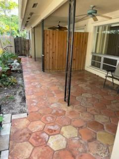 Two large units 1388 Square Feet each unit!  Laundry room in each unit and loads of parking (four cars each side). Close to restaurants, shopping and transportation. Roof under warranty. Storage shed on site. Owner may finance with 35% cash down and not require Wind insurance.