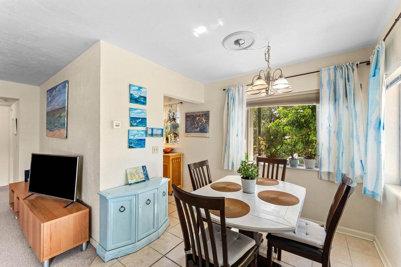 Light, bright, and beautifully maintained, this desirable end-unit condo offers comfort, privacy, and convenience all in one. Featuring the largest 1 bedroom, 1 bathroom floorplan in the community enjoy a spacious living area, a well-appointed kitchen, and a relaxing bedroom retreat. Offered fully furnished and complete accordion hurricane shutters this move-in-ready condo is perfect as a primary residence or vacation getaway. Don't miss the chance to own this inviting and airy home in a sought-after location. Beautiful well managed 55+ complex with many activities, a heated pool, exercise rooms, grill area, library, arts and crafts, auditorium, billiards, ping pong, putting green, woodworking shop, bocce ball, shuffleboard, car washing area and sauna.  Next to Lake Osborne and only minutes from the beach!