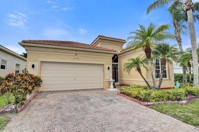 Vizcaya is a sought after adult resort style community featuring 24-hour guard, clubhouse with clubs galore, fitness center,  heated pool, pickleball,  tennis, walking and biking trails. Near shopping, dinning, golf, west of Delray Beach,  downtown Delray, major highways. The home is open and bright, step outside to an oversized screened in lanai in your private backyard overlooking the canal delivering tranquility and peace. The Andalusia model is 2,078 sq. ft. offers high ceilings throughout and an oversized primary suite with dual walk-in closets, soaking tub, separate shower and dual vanities.  Unwind and enjoy year round sunshine in this lovely home.