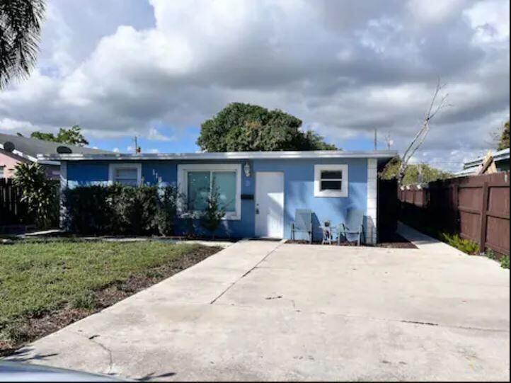 AMAZING INVESTMENT OPPORTUNITY! Located in prime E area just a few blocks from Atlantic Ave and the heart of Downtown Delray Beach. This SFH has an ADU, both rented month-to-month. Front unit $2800/mo. Back unit $1900. Previously an AirBNB . This income producing property offers updated spacious 3 bed/2 Bath front unit with open Living area, kitchen and great Florida room. In back is a cozy 1 bed/1 bath unit with private entrance, separate kitchen/dining and large yard. Separate storage building includes A/C. Plenty of parking, completely fenced in, back fence has gate that opens for even more parking. Room for future expansion due to zoning! Don't miss this opportunity to purchase a great investment property. Live in 1 rent the other, AirBNB or rent both units!