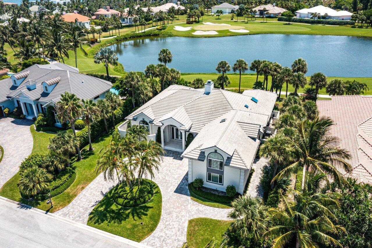 This elegantly designed 2 story home is just steps from the ocean, An expansive interior offers living & dining rooms divided by a stunning double fireplace, a center island kitchen which opens to a spacious family room & glass doors which pocket to enjoy the outdoor living areas including summer kitchen, pool & spa. Interior details include distinctive ceiling treatments, great expanses of glass topped w/ fan-shaped & clerestory windows, rich wood & stone floors throughout. New roof in 2016. Full impact windows and doors. Sailfish Point's unique location directly on the Atlantic Ocean & St. Lucie Inlet at the Southern tip of Hutchinson Island, makes it a community like no other. Sailfish Point offers the ultimate Florida resort lifestyle with its oceanfront country club, fine & casual dining, Har-Tru tennis courts, Jack Nicklaus "Signature" golf course, state-of-the-art fitness center & spa, helipad, 1.5 miles of gorgeous beach, and 24/7 guarded & patrolled security for peace of mind.