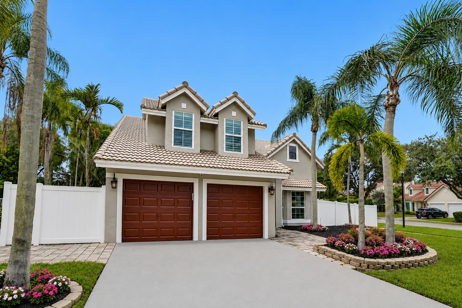 Beautifully updated 4-bedroom, 2.5-bath pool home featuring a new roof (2019), impact glass windows & doors, new flooring, fresh paint, & an open, light-filled floor plan with soaring ceilings. The kitchen has been beautifully remodeled: white custom cabinetry, quartz countertops, newer appliances, & designer finishes. The spacious living & dining areas create the perfect spaces for everyday living. The oversized first-floor primary suite offers a beautifully renovated bathroom, while upstairs you'll find three generously sized bedrooms  & a remodeled full bath. The private backyard oasis features: refinished pool w/ water features, a travertine pool deck, large wood pergola, tropical landscaping, fenced yard offering privacy & plenty of room for outdoor entertaining. Low HOA! A+ schools.