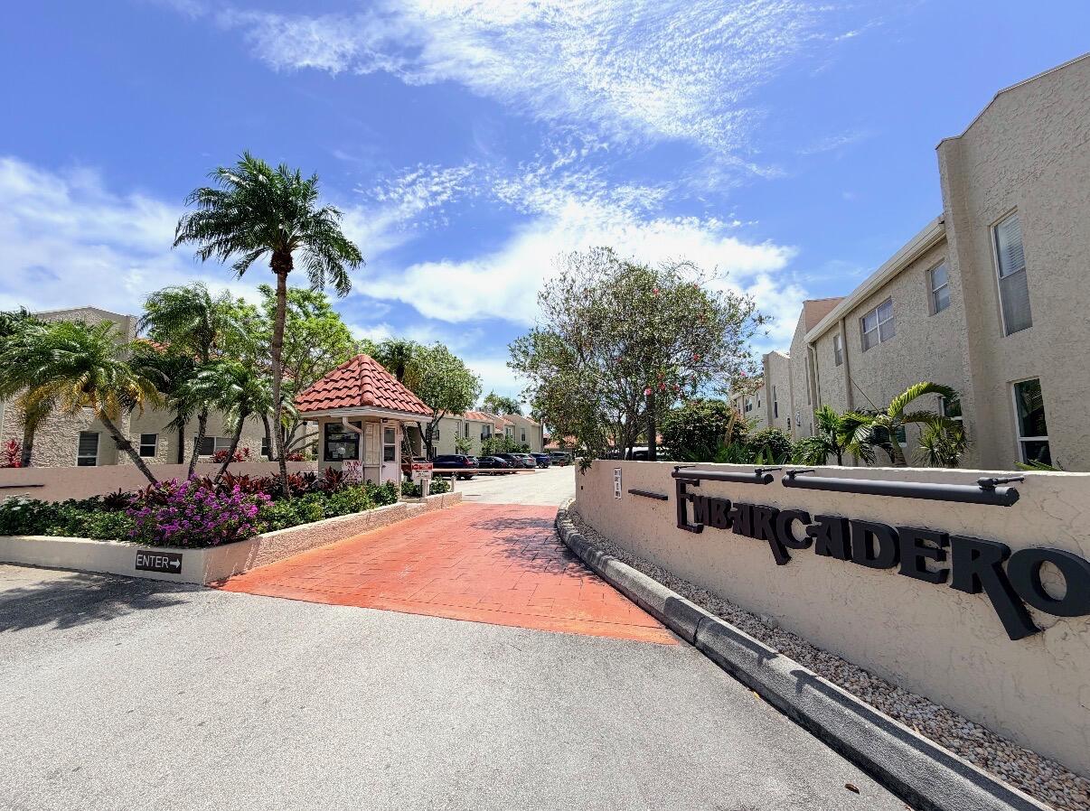 Private screened lanai with pool views, your own exclusive catwalk to the community pool and gym, and a cozy second-floor layout inside a gated, well-maintained community with beautiful landscaping. Great dining nearby, quick I-95 access, close to schools, and just a short drive to the beach — the location checks every box. With just a bit of TLC, this one has the potential to truly shine. Big-ticket items already handled — 40-year recertification complete, brand new roof installed, and all special assessments to be satisfied at close. A great chance to put your personal touch on it and build instant equity.