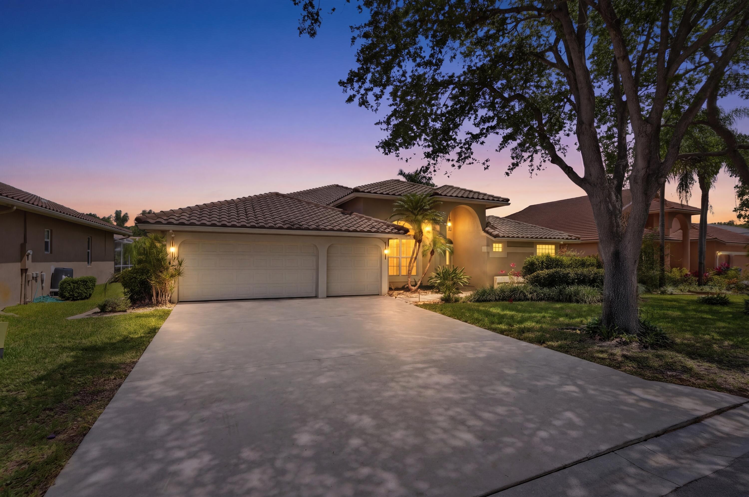Welcome to the highly sought-after North Springs Estates of Coral Springs to this beautifully maintained ranch-style home.This spacious 4-bedroom, 2.5-bath residence features a desirable split floor plan and a 3-car garage.This home boasts soaring vaulted ceilings, elegant crown molding, and modern recessed lighting that create a bright and inviting atmosphere throughout.At the heart of the home is a true custom chef's kitchen, featuring high-end appliances, solid wood cabinetry, under cabinet lighting -perfect for both everyday living and entertaining. Sleek porcelain flooring flows seamlessly through the main living areas and real hardwood floors in all bedrooms. Generous outdoor living area offers mature landscaping & screened in pool w/ spa.Impact windows, doors w/ Cat 5 wiring.No HOA.