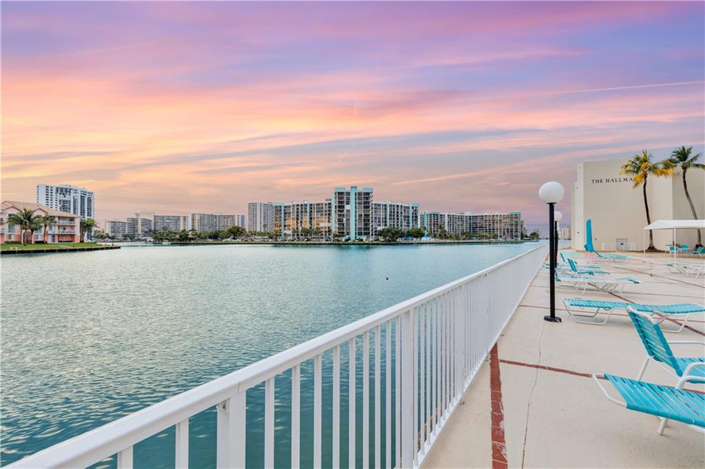 Here's your opportunity to acquire a beautiful condo in the Hallmark of Hollywood.  Situated along A1A with beach access across the street and located directly on the Intracoastal Waterway; the stunning sunsets will amaze you! Magnificent Intracoastal and City Views abound throughout and the charming patio gives you a front row seat to enjoy all the boating activity. This tastefully decorated condo offers the buyer the opportunity to purchase the furnishings separately, just bring your suitcase and move right in.  The Hallmark amenities include a resort-style pool and lounge area on the Intracoastal waterway, a well-equipped fitness center, a card & billiard room, a library, & valet guest parking.  Don't miss this amazing opportunity to secure your own little slice of heaven.