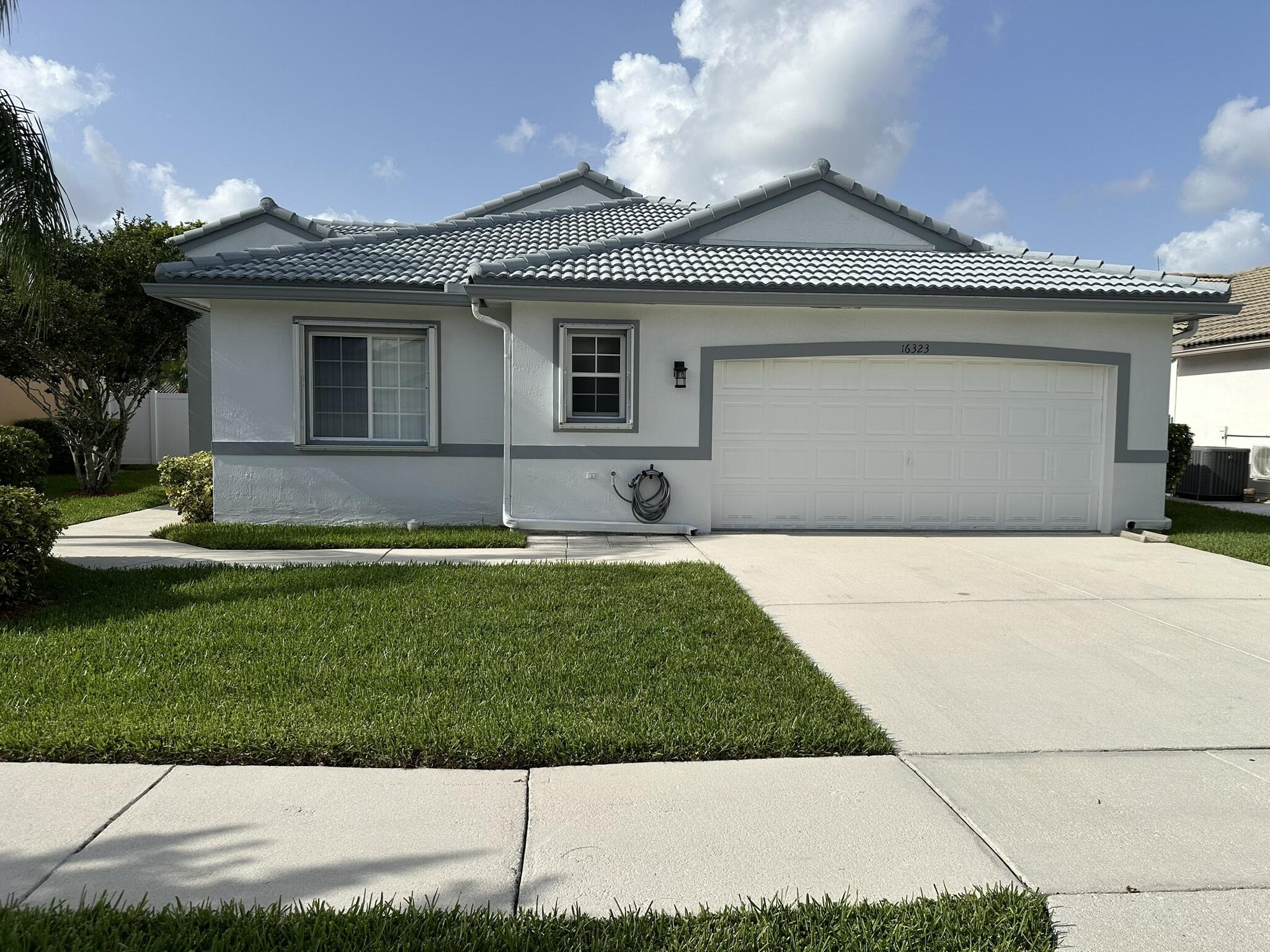 Very clean home in this Pembroke Shores gated community. Desirable Emery model with almost 2,100 sq. ft. under air  Freshly painted interior. Inside features include a split bedroom plan, vaulted ceilings, 3 bedrooms plus a den that can easily be converted into a fourth bedroom, indoor utility/laundry room, large family room, and formal dining room. Master bath includes tub, shower, and dual sinks, Exterior features a spacious, partially roofed and fully screened patio, large, fully fenced backyard with room for a swimming pool, and accordion storm shutters. Tranquil, well maintained neighborhood that shows pride of ownership.