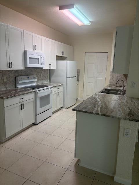 CHARMING READY TO MOVE-IN FIRST FLOOR 3 BEDROOM 2 BATH CONDO. PRIVATE STAIRWELL. GATED COMMUNITY. HAS WASHER AND DRYER. NO PETS. ALL ADULTS OVER 18 MUST HAVE 685 CREDIT SCORE PER HOA. NO COMMERCIAL VEHICLES. NO RENTAL WAIT TIME. GREAT INVESTMENT OPPORTUNITY. ONE YEAR LEASE ONLY 1 TIME PER YEAR.  CENTRALLY LOCATED. GATED COMMUNITY. GYM, POOL AND SMALL PLAYGROUND.