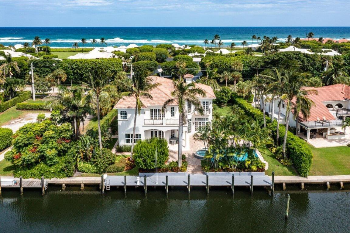 Live Your Waterfront Dream in Upscale Ocean Ridge

 

Available fully furnished, this elegant waterfront estate home with 5 bedrooms and 6.5 bathrooms is located on a .33-acre lot. You'll love the custom designed grand front entry to the main floor with its spacious open floor plan with high, coffered and tray ceilings throughout. The home is bathed in exceptional natural daylight through impact glass doors and windows. 
This home is an entertainer's dream with a large informal family/living room that flows beautifully to the dining room, and easily accessible to the nearby full wet bar complete with ice maker and a wine bottle display in a gorgeous custom glass-doored alcove. 
The large, updated gourmet chef's kitchen features granite countertops, Wolf French top stove, a built-in W oven, Sub-Zero stainless-steel appliances complete with a warming drawer, custom-painted cabinets, a pantry, and a new oversized custom prep island and breakfast bar adjacent to the casual in-kitchen dining area.

 

Just off the kitchen is the formal dining room that provides access through French doors to a private bistro area with an Italian marble fountain, hand painted tile and mature bougainvillea.

 

A custom stained black staircase leads to the second floor featuring beautiful wide plank wood floors, a second upstairs laundry room, an added living area perfect for a play area or tv room with gorgeous views of the canal. Three additional bedrooms each with ensuite bathrooms and walk-in closets are also located on the second level.

 

The master suite features luxurious wide plank wood floors, a large custom walk-in closet, Jacuzzi tub and separate his and her bathrooms with a joined glass shower and a bidet. It also features stunning views of the canal from both the bedroom and the bathrooms with French doors that open to an expansive wrap around deck.

 

With a seawall, 114' of deep-water frontage and no fixed bridges, you'll have direct access to the Intracoastal Waterway and you're just minutes to the Boynton Beach Inlet for easy ocean access. If fishing is your passion, you'll be thrilled with the new synthetic dock with full power, a water pedestal and filet table.

 

The backyard offers spectacular outdoor living space with lush tropical landscaping, an oversized heated pool and spa, evening LED landscape lighting, citrus trees, orchids, and an herb garden.

 

You're just a short walk to the beach or minutes by car to your own deeded McCormick Mile Beach Club with gated parking. Being centrally located between Delray Beach & Palm Beach you're only minutes from world class restaurants, shopping, and entertainment.

 

Other amenities include:

LED recessed lighting

1st floor gym

Cave wine storage with 185 bottle capacity

Whole house generator

New pool pump, heater, and controls

Cabana Bath

Lower level full laundry room with exceptional storage space

2-car attached 500-SF garage

IPAD automation that controls: major lighting, the Sonos sound system, the pool, the new condensing instantaneous water heaters and the HVAC system

New ADT security system

New premium efficient 5-zone AC