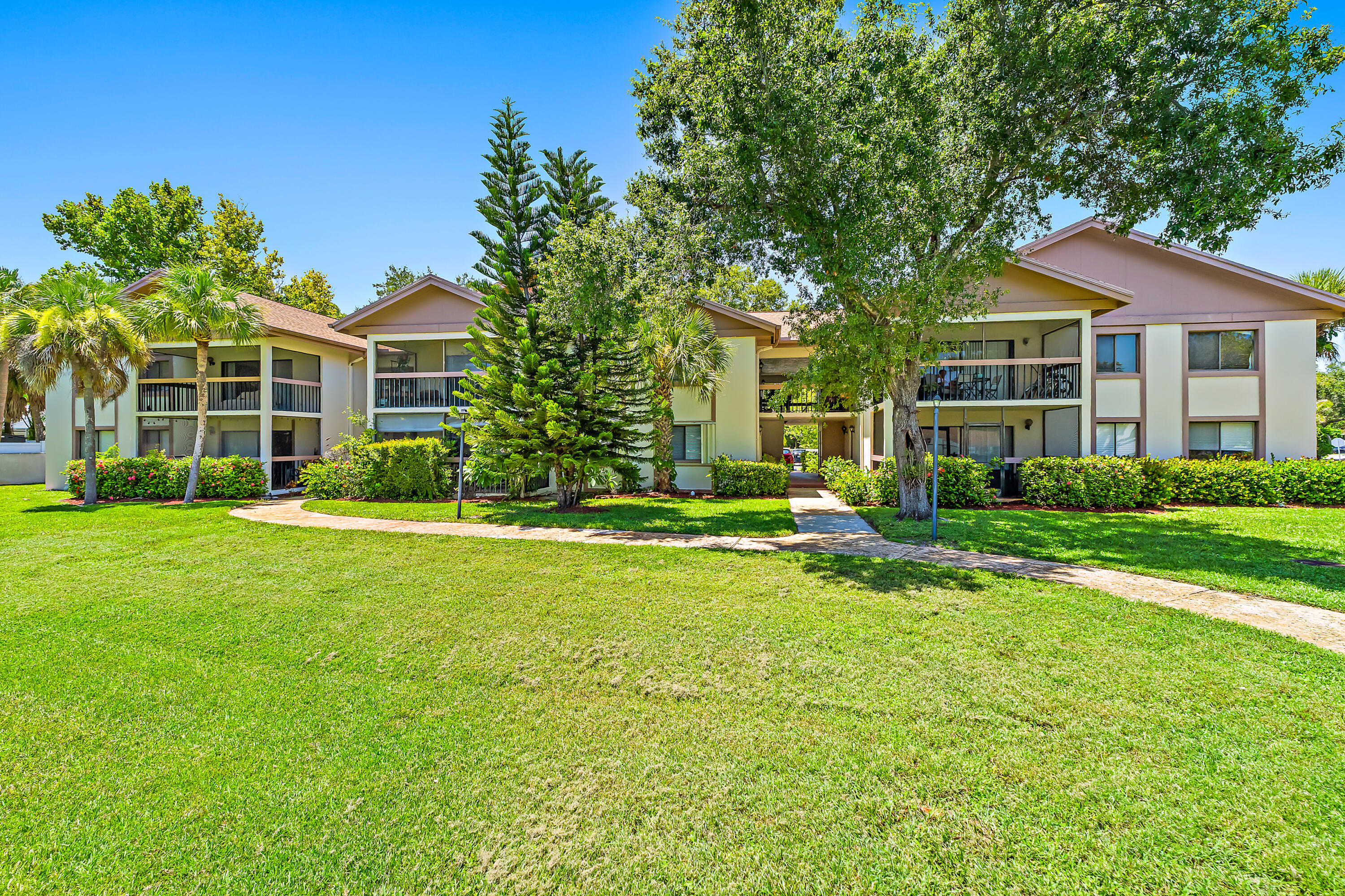 Available for annual lease! This well-maintained and newly painted second-floor 2-bedroom, 2-bath unit in Terrace Gardens offers a spacious layout, a large porch, and an additional storage unit. Conveniently located just minutes from downtown Stuart and Jensen Beach, you'll enjoy easy access to shopping, dining, entertainment, and beautiful beaches. Residents also have access to the community pool, making this the perfect place to enjoy the Florida lifestyle.