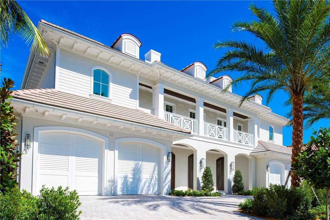 Coastal Transitional Masterpiece! Discerning buyers will appreciate the exceptional finishes and craftsmanship evident throughout this opulent estate. New construction sold in March of 2021, this estate is now being offered fully furnished, turn key. This estate features 5 beds,5.2 baths, gourmet kitchen with Wolf and Sub Zero appliances, Quartz and Quartzite counter tops, Club room, Great room, office, bar, wine room, summer kitchen, an air conditioned 4 car garage, infinity edge salt water system pool, elevator, dual sided gas fire place, 48kw gen, weight and cardio commercial grade gym, Sauna, 100' of water frontage, new concrete seawall and dock situated on one of the most desirable, widest and deepest canals on the Isles. All art and gym equipment included. Truly a one of a kind home! Other items included in the sale:Organic bedding, mattresses, sheets and towelsCustom commercial grade quick-heat cedar Finnleo dry saunaFull weight and cardio commercial grade gym including Peloton stationary bike, Keiser M3i stationary bike, Elina Pilates, treadmill, Stairmaster, Jacob’s Ladder, comprehensive weight lifting equipment2x Renu Therapy sports ice bath recovery tanksAll natural and organic comprehensive cleaning suppliesXfinity, Ring and HIK Vision security and camera systemsXfinity 1TB Wifi-6 throughout the home (Eero Pro)Wolf kitchen, Vitamix, Angel Juicer, Breville espresso machineThree safes for valuables storageState of the art Lennox room-by-room A/C controlGym is housed in two of the garage bays and is air conditioned.5th bedroom is currently being used as the spa/zen room and houses the sauna and a cold water therapy plunge tank.Truly one of a kind magnificent estate!