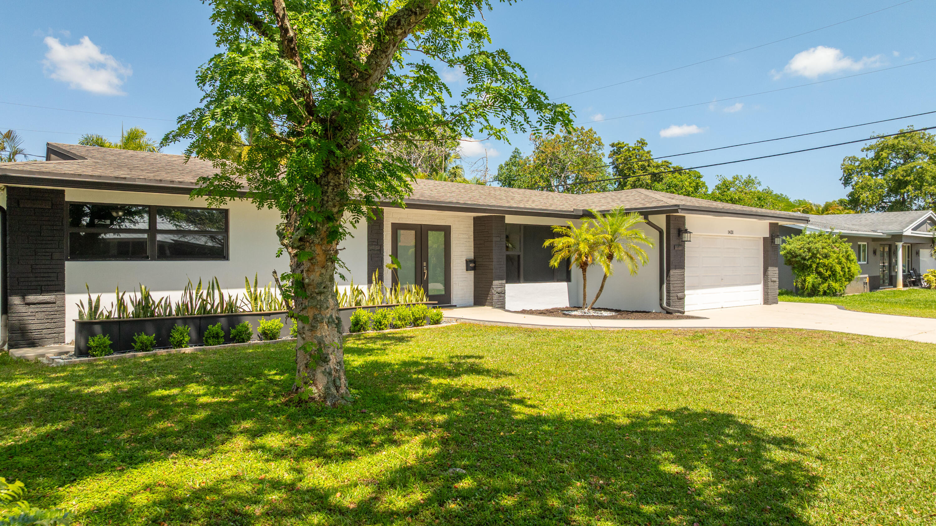 Beautifully updated 4-bedroom, 2-bath pool home in one of Plantation's most desirable neighborhoods with NO HOA. This move-in ready home features updated flooring, custom wall details, recessed lighting, remodeled bathrooms, and spacious living areas perfect for everyday living and entertaining. The renovated kitchen offers granite countertops, stainless steel appliances, abundant cabinetry, and decorative ceiling beams that add warmth and character. Impact windows and doors, newer roof, whole-house generator, and ADT security system provide added value and peace of mind. Tropical backyard with pool, outdoor shower, paver patio areas, and lush landscaping complete this South Florida retreat. Beautifully updated 4-bedroom, 2-bath pool home located in one of Plantation's most desirable neighborhoods with NO HOA. This move-in ready home blends modern updates with warm design touches throughout. Features include updated flooring, custom wall details, recessed lighting, updated soffits, fully remodeled bathrooms, and spacious living areas perfect for both everyday living and entertaining. The renovated kitchen offers granite countertops, stainless steel appliances, abundant cabinetry, and striking decorative ceiling beams that add warmth and character to the space. Impact windows and doors provide peace of mind, along with a whole-house generator capable of powering the entire home. The roof is also newer, adding additional value and convenience for the next owner.  Step outside to your private tropical backyard featuring a sparkling pool, outdoor shower, paver patio areas, and lush landscaping that creates a true South Florida retreat. Additional features include an ADT security system, modern curb appeal, and a flexible layout with both living and family room spaces. Conveniently located near major highways, shopping, dining, parks, and top-rated schools. A rare opportunity to own a thoughtfully upgraded home in the heart of Plantation.