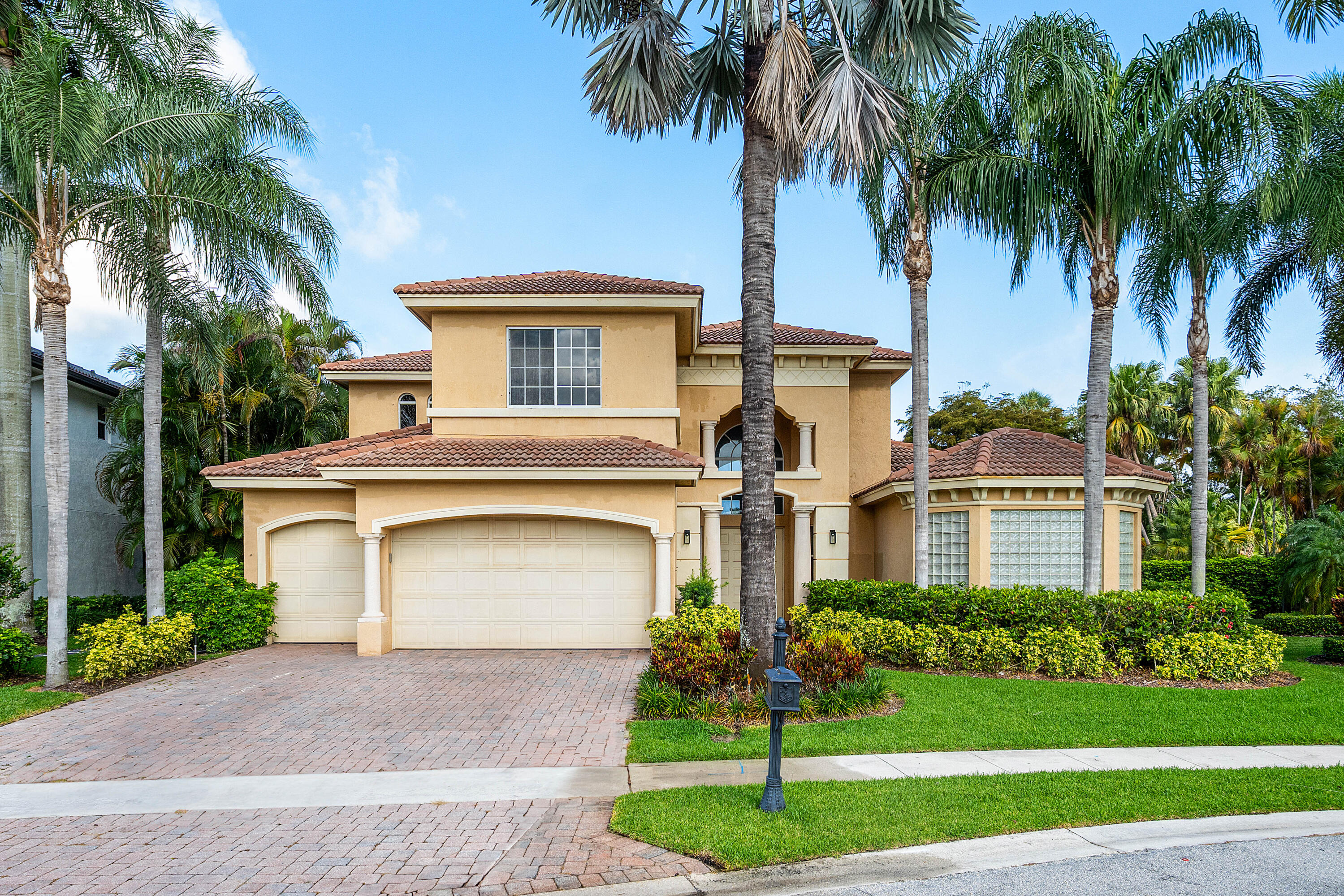 Exceptional restoration/renovation opportunity in Mizner Country Club and this property has IMMEDIATE GOLF available for purchase. This home is located on an oversized lot. The first-floor drywall has been removed approximately 4 feet above the floor to allow for remediation & treatment & ready to be rebuilt.  All A/C's  have been removed. The kitchen is partially removed, providing a head start for a buyer to redesign & complete to their specifications. Sold in as-is condition.