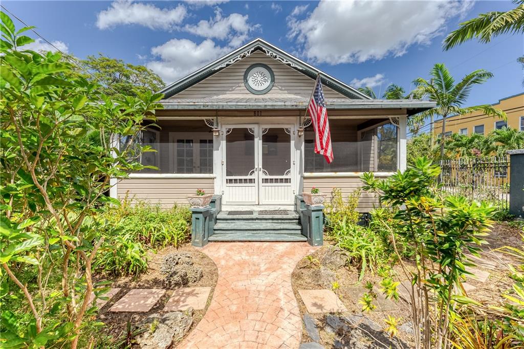 Rare opportunity -- historic HOUSE and COTTAGE in Sailboat Bend, downtown Fort Lauderdale neighborhood.  A wonderful screened front porch welcomes you to the HOUSE:  wood floors, 3 beds / 1 bath & an outdoor shower, approximately 1,100sf.  Granite counters in the Chef's kitchen with gas stove and open shelving.  The COTTAGE is approx 612sf with 1 bed / 1 bath, wood and tile flooring.  Both houses have all impact windows and metal roofs (about 20 years old).  Separate meters for FP&L electric, TECO gas, and water.  Gas service runs the stoves, water heaters, and the dryer.   The lot is huge at 11,500sf with plenty of room to add a resort pool to make this a perfect lush tropical private paradise - Old Florida relaxing vibe!