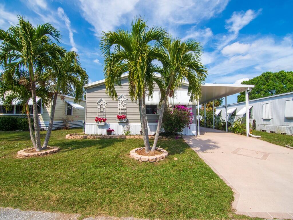 "When you open the door, you walk into a home of luxury, you immediately sense the simplicity and elegance, of this home of coastal colors. Come see this Hidden Gem, it won't be here long." Residents have access to a clubhouse, pool, tennis courts, shuffleboard, billiards, a library, and a beach club.