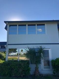 NW corner of King's Point near the Main Clubhouse.  (Entrance on Atlantic Ave)  Great views from the enclosed porch from this 2nd floor 1BR, 1 1/2BA condo.  Located near the elevator.  Needs TLC.  Kitchen has updated cabinets, counter top, and lighting.  Enclosed porch is air conditioned and faces east.  Easy to show.