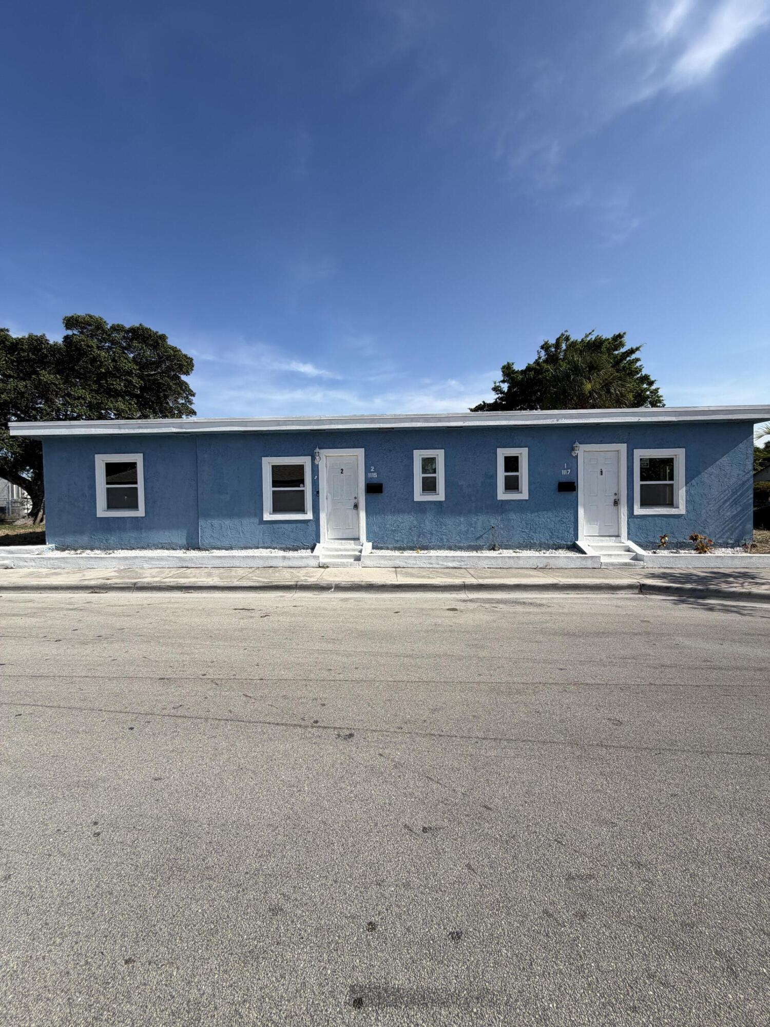 Say hello to this Beautiful Duplex Located in the heart of Lake Worth Beach, Minutes from the beach and Publix Shopping Center.  This boast Renovated units with IMPACT Windows and doors, tankless hot water heater in each unit with new granite kitchen tops and Stainless Appliances