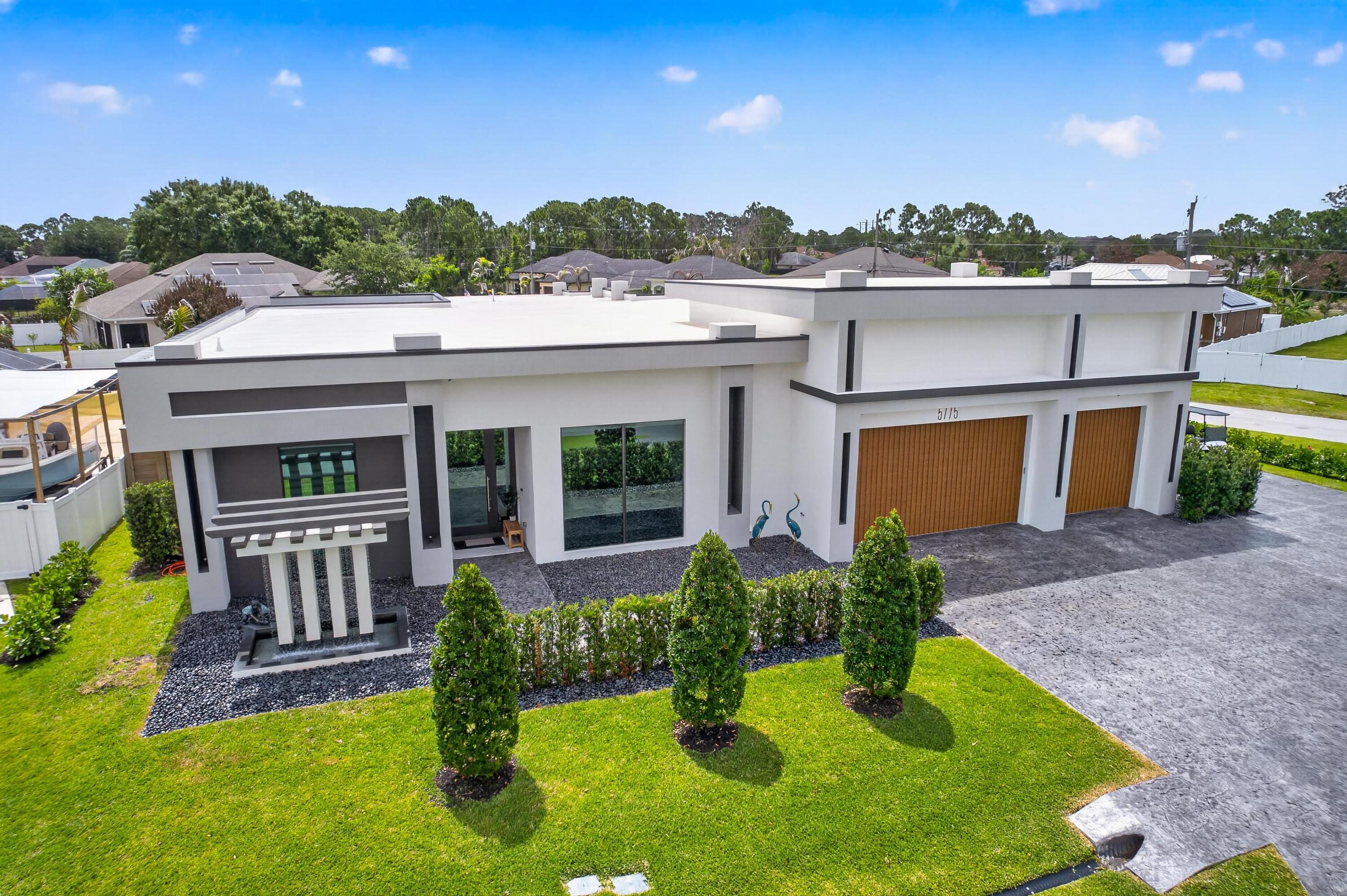 A contemporary, elegantly designed 4,715 sq ft, 4 BR, 5.5 BA custom pool home. This residence blends luxury, functionality and architectural finesse. Clean modern lines, soaring ceilings and expansive impact glass invite natural light throughout which creates a seamless connection between indoor comfort and outdoor living.  The heart of the home is a chef inspired kitchen featuring Thermodor appliances, custom cabinetry and an oversized island ideal for gatherings. A spacious open concept living area flows effortlessly to the covered lanai with a resort style pool and great for entertaining. A standout feature is the convertible game room /mother-in-law suite with its own private driveway, separate entrance, full kitchen and laundry room - exceptional space for extended guests!  *.41 ACRES ON OVERSIZED CORNER LOT IN TORINO / NO HOA *3 CAR GARAGE W/ CUSTOM MADE GARAGE DOORS - SEPERATE A/C FOR ADDT'L 946 SQ FT *THERMOPLASTIC POLYOLEFIN ROOFING (TPO) HIGHLY ENERGY EFFICIENT *ICYNENE FOAM INSTALLATION  *LARGE FORMAT, PORCELAIN TILES *CROWN  MOLDING THROUGHOUT *CUSTOM CABINETRY AND CLOSETS  *5K LED INTERIOR & EXTERIOR LIGHTING   *11 FT CEILINGS *SOLID CORE  8 FT INTERIOR DOORS  *IMPACT WINDOWS AND DOORS / DOUBLE INSULATED LOW-E *18 FT LONG EURO DOOR IN GAMEROOM *CUSTOM SHADES & BLINDS  *THERMODOR MAIN KITCHEN APPLIANCES  *OVERSIZED WALK-IN PANTRY WITH ADDT'L REFRIGERATOR  *SOFT, SLOW CLOSE POCKET DOORS  *OVERSIZED (2500 SQ FEET) STAMPED & SEALED DRIVEWAY WITH 3 ACCESS POINTS  *IRRIGATION SYSTEM  *KNIFE EDGE SALTWATER POOL/SPA  *WHOLE HOUSE GENERATOR WITH 1000 GALLON TANK  *2 TANKLESS GAS WATER HEATERS  *UNDERGROUND WATER RUN-OFF FOR DRAINAGE  *LARGE ATTIC STORAGE   *HOT SPOT FOR WIFI INSTALLED THROUGHOUT THE HOUSE  *PRIVATE TURF BACKYARD WITH MARINE-GRADE WOOD FENCE  *3 A/C UNITS  *GAMEROOM/MOTHER-IN-LAW SUITE WITH SEPERATE ENTRY-DRIVEWAY- KITCHEN-LAUNDRY *PROPERTY ENROLLED IN A 1-1-10 WARRANTY PLAN (THROUGH 2-10 HBW) IN WHICH REMAINDER OF THE STRUCTURAL WARRANTY CAN BE TRANSFERRED TO BUYER AFTER CLOSING