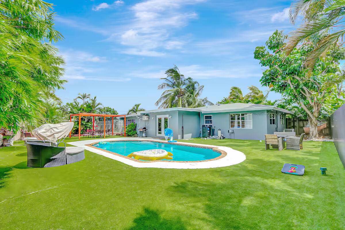 Welcome to this beautifully furnished 3-bedroom, 2-bathroom home located in the heart of Wilton Manors, just minutes from vibrant Wilton Drive, Downtown Fort Lauderdale, and the beautiful Fort Lauderdale Beach. Offering the perfect blend of comfort and convenience, this move-in-ready residence features a sparkling pool surrounded by lush tropical landscaping, ideal for relaxing or entertaining, along with a BBQ area for enjoying the South Florida lifestyle. The converted garage has been transformed into a fun game room, providing additional space for indoor entertainment. Water, electricity, trash service, and Netflix are included, making this fully furnished home an exceptional opportunity to experience the very best of Wilton Manors living