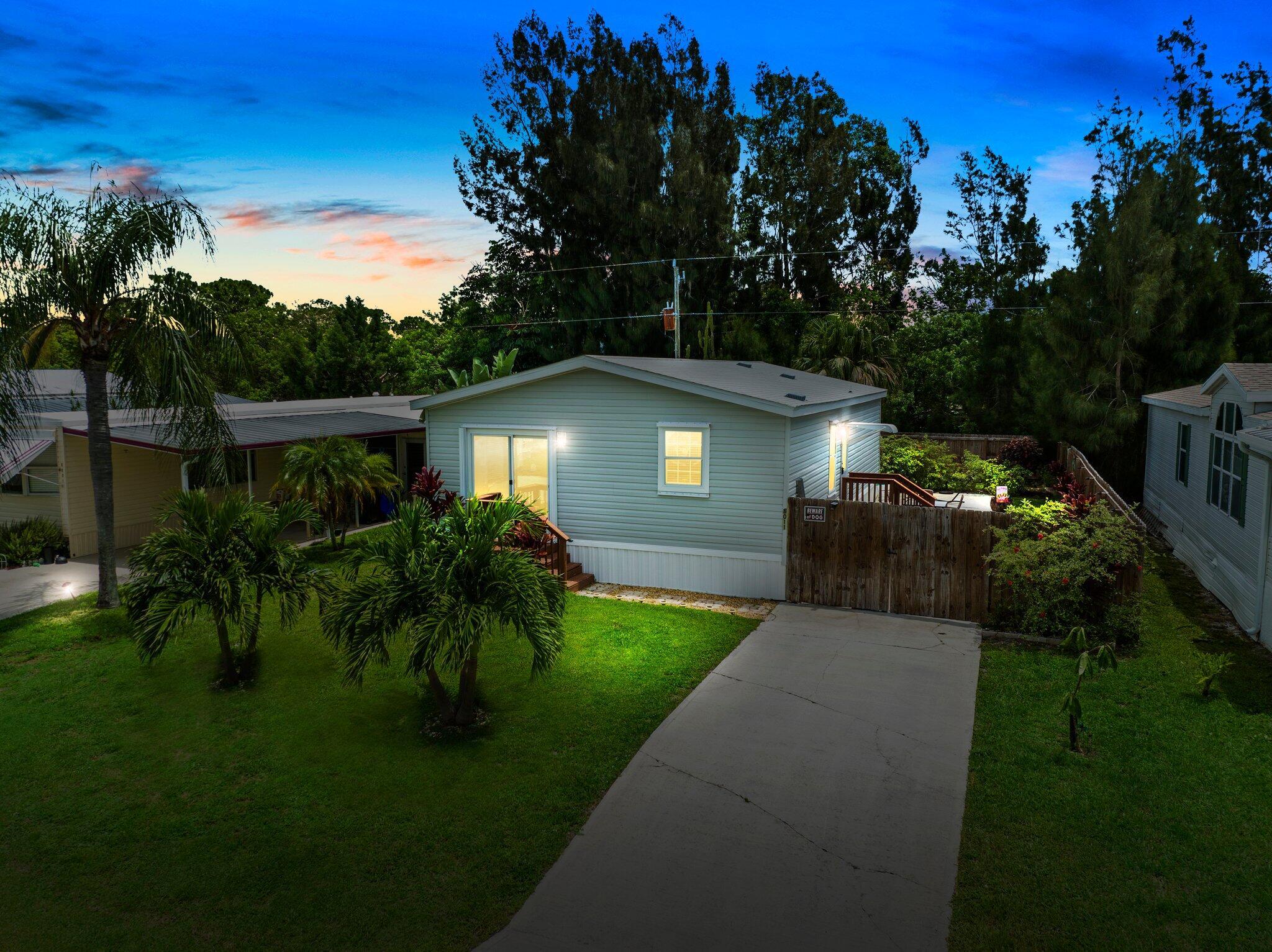 FULLY FURNISHED!! Discover this Immaculate and Beautifully Maintained 2 Bedroom, 2 Bath (2019 Build) Manufactured Home, in Ridgeway! Just Professionally Cleaned- Interior and Pressure Washed- Exterior! Newer Fenced-in yard with Mature Landscaping, Irrigation System, open Patio/Grill Area perfect for Entertaining outdoors and so much more! Natural Light beams throughout this entire Home from every angle! The Home features an Open and Spacious floor plan, with Vinyl Flooring, Laundry Inside, Glass Slider leading out to your front yard. The Kitchen has 36-inch Cabinets with plenty of counterspace/storage, and a separate Dining Area. Master Suite has a standup Shower, Vanity, and a Walk-in Closet. Ridgeway is an All-Age Community, with No HOA. Just minutes from Local Shops, Restaurants, Boat Ramp and Beaches, centrally located in Hobe Sound! Come see all this Home has to Offer today!