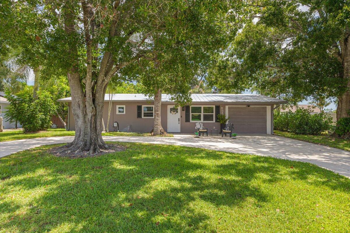 Beautifully fully updated 3-bedroom, 2-bath CBS home offering peace of mind and modern comfort throughout. This move-in-ready property features impact windows, updated interior finishes, and needs absolutely nothing. The home sits on a large lot with a spacious circular driveway, providing ample parking and great curb appeal. The expansive backyard offers plenty of room for a pool, outdoor entertaining, or future expansion. Solid construction, modern updates, and generous outdoor space make this home a standout option for buyers seeking quality and convenience. Ideal for primary residence, second home, or investment.
