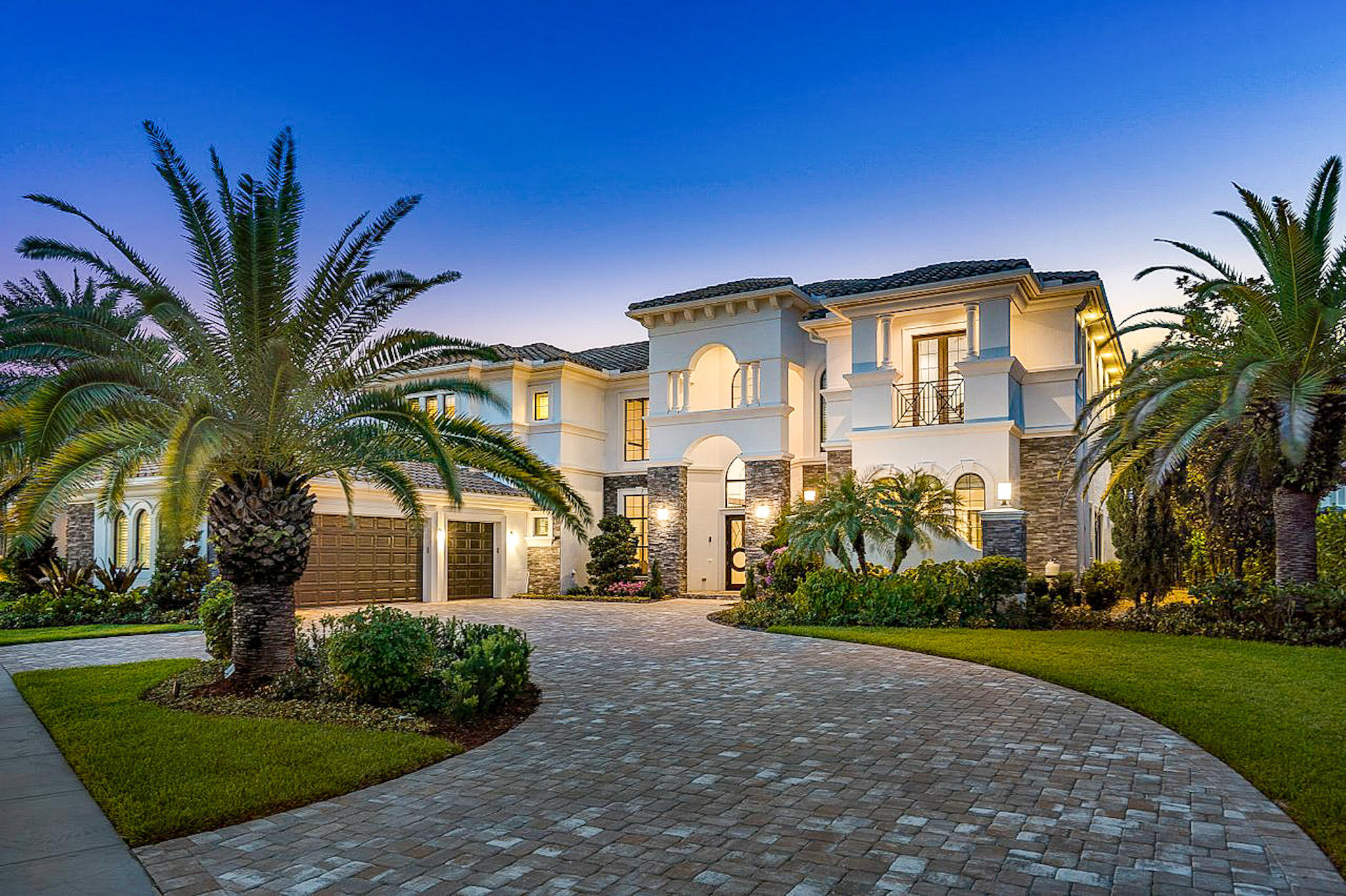 Stunning & Spacious Villa Lago model with long lake views in desirable Royal Palm Polo. Featuring 6 bedrooms, each with ensuite baths+office+theater. Top-of-the-line upgrades throughout, including a generator,water filtration system, an elevator, & a Crestron full home automation system. Main level features soaring ceilings, a formal dining & living room w/ fireplace, a bar, & a great room with an expansive custom kitchen with wolf+subzero appliances, butler pantry, office, guest bedroom + the Primary Bedroom overlooking the lake. Upstairs you'll find the theater, the 2nd Primary Bedroom & 3 additional bedrooms. The backyard will take your breath away with the  resort-style heated infinity pool with a spa, and plenty of covered space to lounge & entertain by the summer kitchen. A Schools! This is a stunning & spacious custom-built home located in the prestigious gated community of Royal Palm Polo in Boca Raton, Florida. With a gorgeous lake view, the property boasts seven bedrooms, each with an ensuite bathroom, as well as 1.5 powder rooms. The main level features a luxurious master bedroom with custom walk-in closets & his-and-her baths, a two-story great room with an electric fireplace and a bar, a formal dining room, a study/office, a family room, & a chef's kitchen with top-of-the-line Wolf appliances, marble countertops, & a butler's pantry. There's also a theater room, an exercise room, & an elevator.
Designed for entertaining & relaxation, the home includes custom lighting in the family room, a cozy breakfast area overlooking the infinity saltwater heated pool & spa, & a summer kitchen with a covered lanai. The second level offers a second master bedroom with a private balcony and stunning lake views, as well as three guest bedrooms, a loft, and a theater room. The home also boasts a $120,000 custom Crestron home automation system that controls the audio/visual, sound, temperature, blinds, drapes, lights, & security cameras.
Additional features of the property include a full-house generator, a full-house Allini Systems water-organize filtration system, a three-car garage with custom built-ins, & masterful landscaping with a water fountain. The Royal Palm Polo community provides excellent amenities, such as a tennis center with six har-tru courts, including one pickleball court and one stadium court, a half-court basketball court, & a children's playground. The 5,000 sq ft clubhouse offers a state-of-the-art fitness center & a resort-style outdoor bar, spa, pool, & BBQ area. This remarkable home is located just a few miles from beautiful beaches & top-rated public & private schools, making it the ultimate retreat for relaxation & entertainment.