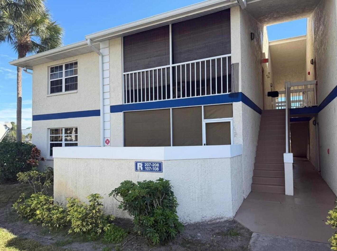 LONG TERM TENANT IN PLACE — a well-maintained condominium community in the heart of Port St. Lucie's highly convenient east-side corridor. This 1-bedroom, 1-bath, 705 sq. ft. first-floor unit offers comfortable, low-maintenance living with the added benefit of easy access to parking, walkways, and community amenities — perfect for a full-time residence, seasonal escape, or income-producing investment. The open living and dining area provides a practical, efficient layout with sliding glass doors that bring in natural light and connect to the outdoor patio area. The kitchen features ample storage and countertop space, and the spacious bedroom includes a large closet and adjoining full bath. Tile and laminate flooring throughout make the home easy to care for and ideal for Florida living.