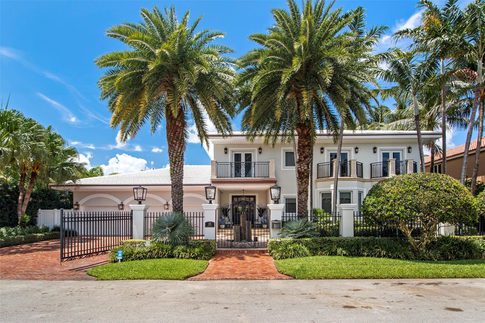 Located in guardhouse secured Seven Isles, this stunning custom deepwater residence on 100ft of waterfrontage has much to offer! Elegant entertaining spaces flow to a fabulous covered pool pavilion for outdoor entertaining & extremely private pool area with tropical landscaping. This welcoming residence unfolds beautifully from the entry foyer, media room/lounge, formal living room & custom eat-in kitchen. Two bedroom suites on the first level with luxurious primary & additional en suite on the second level. Pelican Isle is one of the most desirable isles with great curb appeal & larger lot sizes (13,012 sf).  If you are looking for a deepwater home with warmth & character, this might be a great match!