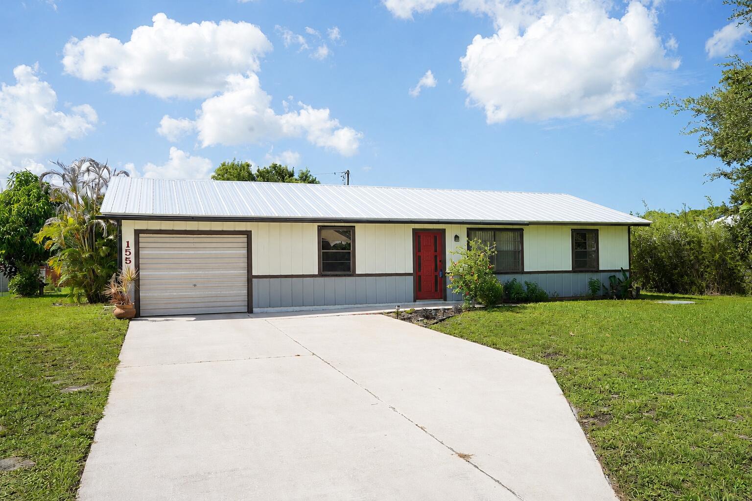 NO HOA, an oversized lot, and room for all your toys! This 3-bedroom, 2-bath home offers a desirable split floor plan, great layout, newer flooring throughout the main living areas, and a HUGE Florida room perfect for entertaining, relaxing, or creating additional flexible living space. Big-ticket updates include a newer metal roof installed in 2023 and a newer water heater. Bring the boat, RV or both with plenty of space to park! The spacious backyard offers endless possibilities, including plenty of room to add a pool and create your own private Florida oasis. Additional features include a 1-car garage and a backyard shed for extra storage. Conveniently located near I-95 and the Florida Turnpike for easy access to shopping, dining, and everything the area has to offer.