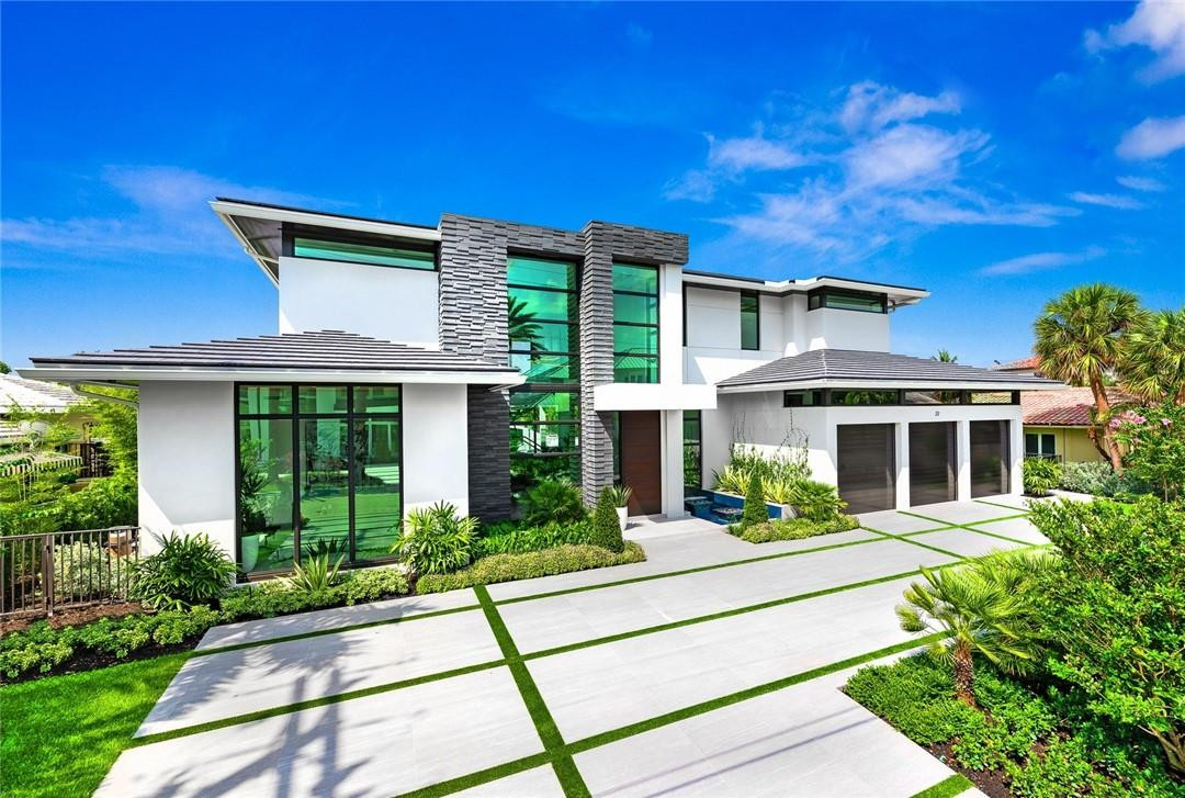 One of the latest new construction offerings in Harbor Beach is now ready for your enjoyment. This modern masterpiece was designed by award winning architect John Conway and built by renowned builder Danny Minkin, impeccably constructed with superior finishes and craftsmanship. The first floor features a stunning master suite, great room, club room with bar, climate controlled wine room and office. 2nd floor features 5 additional en suite bedrooms, loft area, and an additional laundry room. Interior features include a custom entry 24' 3D wall with LED lighting, book match marble, linear fire feature, marble baseboards with reglet inset, walk-in pantry, elevator, cove ceilings with LED lighting.  ?Custom entry water/fire feature, 3 car garbage will accommodate lifts, 48 KW generator