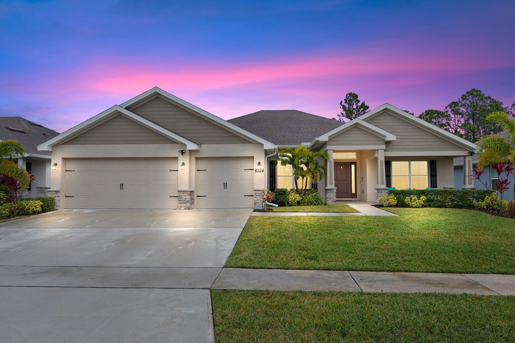 This stunning 2022-built CBS home features (4) beds, (3) baths, a (3) car garage, & over 2,500 SQFT of stylish living space, making it one of the largest floor plans in The Waterstone Community. Situated on a premium lot backing up to the preserve. Smart home upgrades include Alexa-controlled lighting, motorized window coverings, WiFi-enabled locks, & a Ring security system. Inside, enjoy vaulted 10-foot ceilings, spacious bedrooms, & multiple walk-in closets, while the kitchen boasts ample cabinet & countertop space for entertaining. The Waterstone community features a clubhouse, pool, fitness center, playground, pickleball, & sidewalks; all with a $12 a month HOA. Located just minutes from the beach, shopping, dining, & with easy access to I-95/ Turnpike.